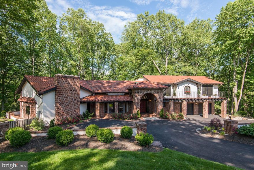 PRICED TO SELL* STUNNING MEDITERRANEAN INSPIRED CUSTOM HOME ON PREMIUM CUL DE SAC LOT ACRE + LOT* ENJOY SCOTTS RUN PRESERVE, TRAILS & VIEW OF THE POTOMAC RIVER* LIGHT ABOUNDS FROM THE SOARING CEILINGS & WINDOWS, LEVELED PATIOS & FRENCH DOORS ALONG THE REAR OF THE HOME*LARGE GOURMET KITCHEN W/SS DBL OVENS, 6 BURNER GAS STOVE & 2 DWs*LUXURIOUS MASTER SUITE WITH DRAMATIC FIREPLACE* WALKOUT LL