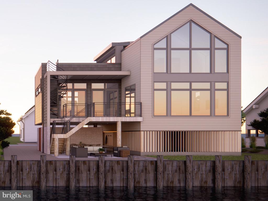Built by Grit Coastal. Luxury New Construction Canal-Front Home in South Bethany Beach. Welcome to 318 York Road your dream waterfront retreat! This brand-new, custom-built home is situated on an oversized lot in the sought-after community of York Beach. Boasting 5 spacious bedrooms and 4 luxurious bathrooms, this exceptional property offers breathtaking canal views, top-of-the-line finishes, and an unparalleled coastal lifestyle. Designed for both comfort and style, this home features an open-concept living area with high ceilings, abundant natural light, and seamless indoor-outdoor flow. The gourmet kitchen is a chef’s delight, equipped with premium appliances like Sub Zero 42" Refrigerator, Wolf 36" Induction range, Wolf 24" Built in Microwave, Cove 24" dishwasher & XO Built in Vented Hood. Quartz countertops, a large center island, and custom built cabinetry complete this amazing kitchen. Additional features include: Spacious primary suite with a spa-like en-suite bath, Private guest rooms, 3 with own ensuite bathrooms, white oak wood flooring throughout and beautiful finishes that separate this home from others, including a electrical vehicle charging station. Step outside to enjoy multiple outdoor living spaces, including expansive deck and roof top perch perfect for dining, lounging, and soaking in the serene water views. Two outdoor showers provide convenience after a day on the water or beach and ample parking and storage under the home. With direct canal access, this home is a boater’s paradise to the bay . Located just a short walk or bike ride to the beach, this extraordinary home offers the perfect combination of luxury, convenience, and coastal charm. Whether you’re looking for a year-round residence or a vacation getaway, this waterfront oasis is ready to welcome you home. Too many details to list, ask for a copy of special features/construction features breakdown. Some rooms have been virtually staged with furniture to provide ideas for potential layout. Don’t miss this rare opportunity—schedule your private tour today!
