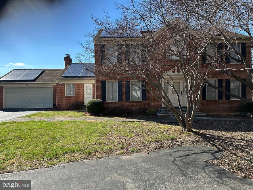 Back on the market, the contract fell through. Tucked away in a private entrance in the highly desirable Springbrook neighborhood in Silver Spring, this brick-front colonial home offers the perfect blend of privacy, space, and everyday convenience. Sited on a private court conveniently located near major commuting routes and offers amenities galore! This home boasts a Colonial floor plan with features including a formal living room and dining room with hardwoods, moldings, and custom drapes; an eat-in kitchen with a huge pantry and oak cabinetry; and an entry to the deck; a spacious master bedroom with double-door entry, a walk-in closet, custom drapery, and luxury. Walkout basement and recreation room. Needs upgrades