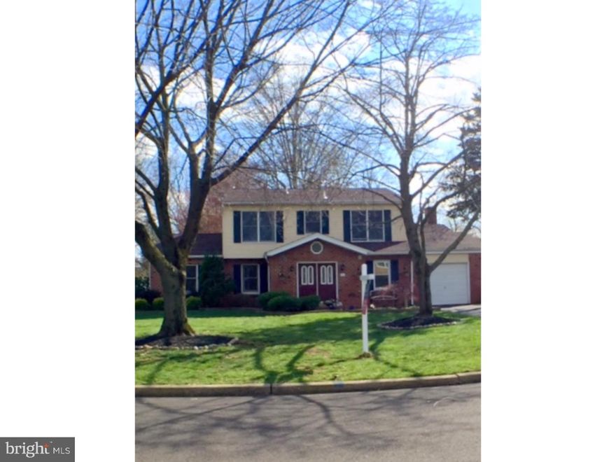 Welcome to this bright, open, and clean-designed  Colonial. Enter through the tiled raised roof  foyer that leads to a sunny living and dining room floored with gleaming hardwood and recessed lighting.  Hardwood floors stretch out into the warm toned kitchen with custom cabinets, granite counter-tops, ceramic tile back-splash, and sleek stainless steel appliances including  Fisher & Paykel DishDrawer Dishwasher.  Kitchen opens into cheery  family room centered around marble hearth gas fireplace that turns on with a flick of a remote. French doors open into your oasis BONUS room with custom built-in wet bar, tiled floor, floor to ceiling wall of windows, skylights, and separately zoned heating and air.  Entertain or shut the rest of the world out here.   1st  floor office adds more space to this fine home and is closed off for privacy. The iron and wood handrails take you up to the 4 amply sized bedrooms also completed with hardwood floors.  The home is situated on almost a half acre lot with a slate patio out back and fenced-in rear yard. NEW Roof and shutters replaced 2015!!  Come see this great place to call home!!