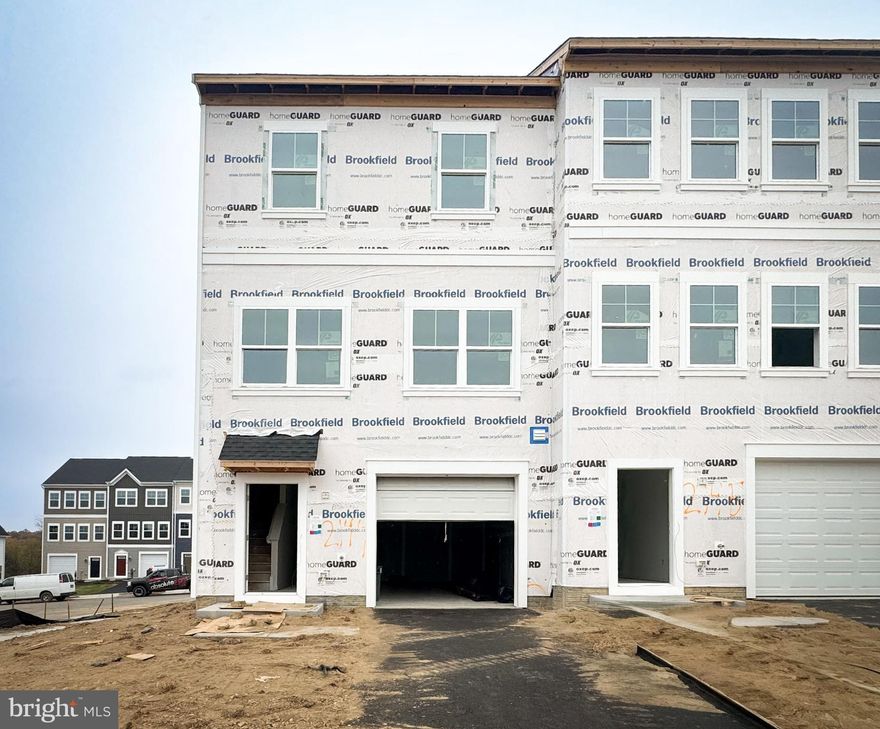 Brand New End Unit Townhome is coming to life and will be ready soon! 
Enjoy the three-finished and extended levels that make up this end unit townhome, with natural light streaming through the generous windows in the living room. The main level features an open-concept design, seamlessly connecting the living room, dining area, and kitchen. The rear kitchen crisp white cabinets, quartz countertops, and a super island. It opens up to a charming breakfast nook, creating the perfect setting for daily life and entertaining.  Off the kitchen is a sundeck perfect for relaxing. 
Head up the staircase to the upper level to the primary suite with a large walk-in closet and en suite with soaking tub. Additionally, there are two secondary bedrooms, a full bath, and a conveniently located laundry area to complete the upper level. 
A lower level is finished with rec room and powder room!
This is home!
Located in Snowden Bridge, a premier master-planned community with exceptional amenities including a swimming pool, pirate water park, indoor sportsplex, community park, fenced in dog park, and playground. In addition, there is a bike track, walking trails, and a picnic pavilion. You won’t have to leave to have fun, but when you do, you’re just minutes from all the convenience and entertainment around Winchester. 
Ask about special fixed rate financing and closing costs!
