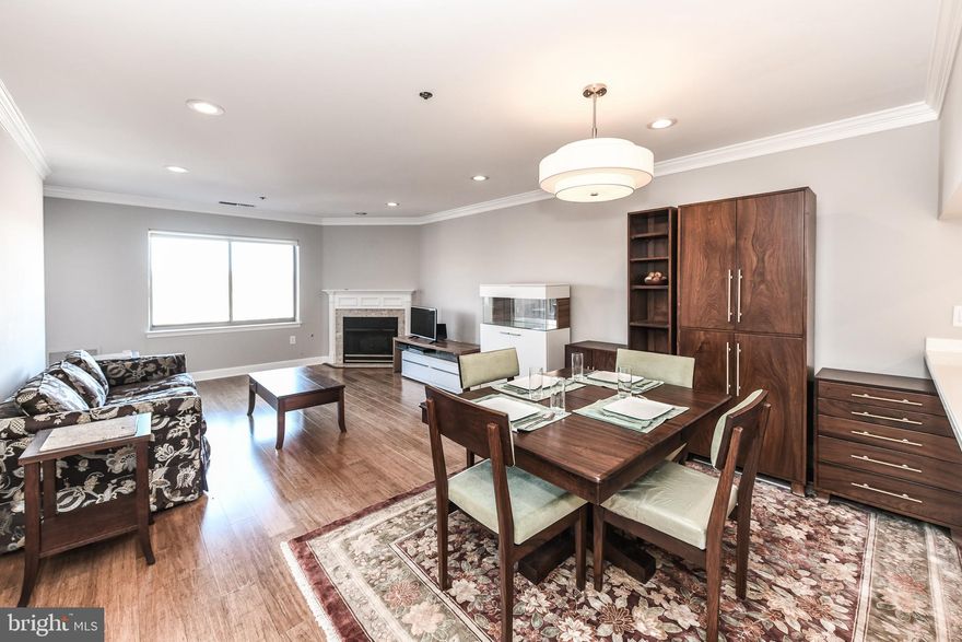 Fantastic location in highly sought-after Ballston Park! Just 1/2 block from Ballston Metro! Updated 1BR, 1BA with TWO assigned parking spaces*White on white kitchen with tiled floors leads to dining area*Light & bright living room with cozy fireplace & beautiful hardwood floors*Sliding glass doors walkout to nicely sized brick balcony with city views*Spacious bedroom with walk-in closet & renovated bathroom with designer tiled floors & shower*Building Amenities include Fitness Center & Party Room*Pets considered on a case-by-case basis-Max 2 pets less than 25lbs each*Easy walking distance to everything Ballston has to offer**Landlord will pay half [$200] of the Condo Move in Fee on behalf of tenant*Available now!