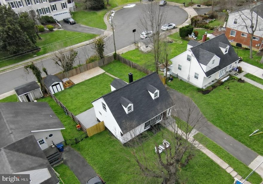 Beautifully updated 4BR/2BA Cape Cod just minutes from Old Town Alexandria, offering the perfect blend of modern upgrades, flexible living, and exceptional convenience. Light-filled main living and dining areas feature large front windows and newer flooring throughout. The fully renovated kitchen (2022) showcases white shaker cabinetry, quartz countertops, subway tile backsplash, stainless steel appliances, recessed lighting, and ample storage.

Flexible layout with two bedrooms and one full bath on each level. Both bathrooms were fully renovated (2022) with modern finishes.

Private, fully fenced backyard offers a spacious, flat lot ideal for entertaining, pets, or play, complete with a large patio, new deck (2025), storage shed (2025), privacy fence (2025), and custom gravel play area with sandbox (2025).

Major updates include a new roof (2022), recessed lighting (2022), HVAC with gas furnace (2016) and evaporator coil (2022), and washer/dryer (2022). Long private driveway provides ample off-street parking.

Premium lot backing to quiet cul-de-sac (Griffin Dr) with excellent potential to expand, build a garage with possible upper-level ADU/in-law suite, or customize outdoor space (buyer to verify).

Conveniently located near shopping, parks, schools, Route 1, GW Parkway, DC, and Old Town Alexandria.