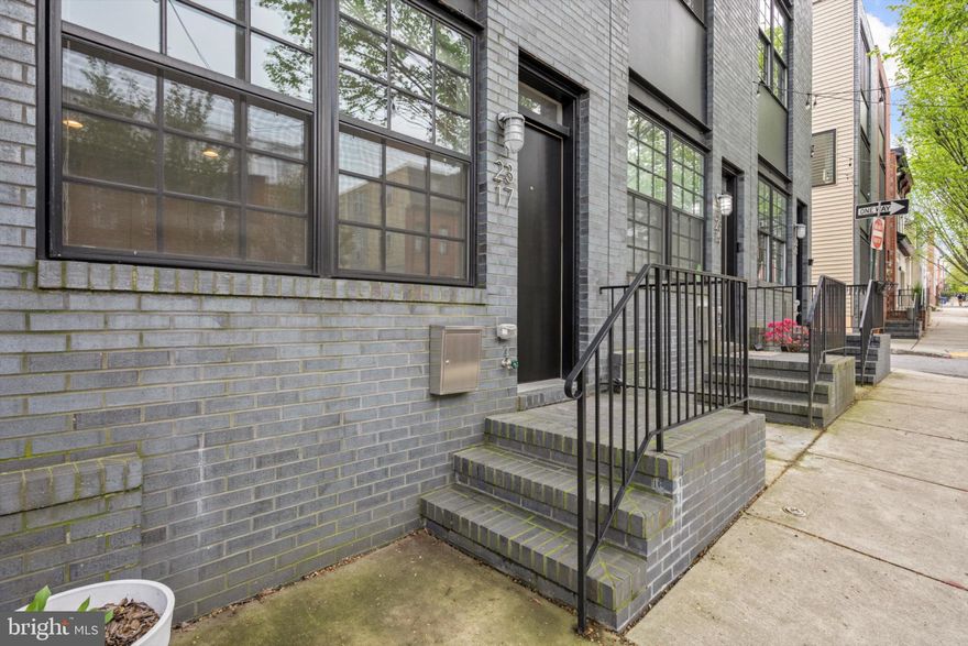 Contact Listing agent for your private showing! This 2015 built contemporary row home with 3 bedrooms and 3 full baths is in sought after Patterson Place one block from Patterson Park, an easy walk or drive to Hopkins and neighborhood restaurants, and convenient to Fells Point and Canton. With an attached garage and an additional private parking space in back, there’s always space for company. If you want to leave the cars at home, the CityLink Blue/Orange lines are just a block away. 

The first floor bedroom and down hall bathroom can also serve as a private office or bedroom convenient to on-street parking and the front entrance. On the second floor, spacious high ceilings and large windows in the tree tops frame the living room, with an adjoining dining area and connected modern kitchen, with a seated bar, which opens to a covered balcony for outdoor grilling and fresh air. 

The primary bedroom is lit by large windows with views towards Patterson Park, and features an ensuite bath with a double vanity and spacious shower, along with a wall of closets on the third floor. Down the hall is the full sized laundry room with ample countertops and cabinets. The third bedroom and bath, on the other end of the hall, are adjacent to the entrance to the spectacular rooftop deck, featuring a 360 degree view of the Baltimore skyline and all the stars and fireworks that fill it over the year, the ultimate retreat and entertainment space, crowning this beautiful home.

Requirements for renting this home: 700+ credit score, 4x annual rent ($148,800 annual or $12,400 monthly), No prior evictions or record of property damage, No Pets, no smoking.