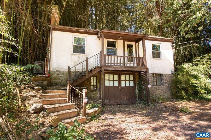 Opportunity awaits at 554 Valley Road! Just ONE MILE from UVA Medical Center and Scott Stadium, this one-bedroom, one-bath home offers outstanding potential in a highly desirable location. Ready for a full renovation, it?s ideal for investors, renovators, or anyone eager to bring their creative vision to life. The main level includes a living room, dining area, kitchen with side entrance, primary bedroom, and full bath. The unfinished basement provides excellent space for storage or a workshop. Zoned R-B, the property offers the potential to accommodate up to six units (buyer to verify). Whether you?re seeking a home near Grounds or a savvy investment in a sought-after location, this property is full of promise. Incredible location with a short walk or bike ride to shopping, dining, and nightlife!,Wood Cabinets,Fireplace in Living Room