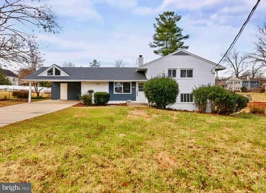 Beautifully and Elegantly Renovated Split Level home located on a spacious corner lot, with 4 bedrooms and 2.5 bathrooms***Enter through the front door to a bright and  open concept to a custom kitchen with a waterfall quartz counter island, white cabinets and stainless steel appliances, a spacious half bath, a formal living room/dining room area with a beautiful wood fireplace, that steps down to a large family room with an electric fireplace and custom designed accent walls that open into an additional room with cathedral ceilings that can be used as a library/study/office, walking out to a cozy deck and fenced yard***Take the stairs to the upper level with the master bedroom and two additional bedrooms with a full bath with elegant tiling and fixtures**Cascade the stairs to the lower level leading to another full bath with elegant tiling and fixtures, a spacious bedroom, a rec room that can also be used as a game room with access to the side yard and the laundry room***Custom tasteful renovations throughout with all new bathrooms, all new kitchen, painting and custom woodwork, lighting, flooring, hardware, deck  and more!! Conveniently located on a spacious corner lot with a long driveway leading to a 2 car carport***Just minutes for commuters for access to I95, 395 & 495, metro bus stops, metro rail, schools, Springfield Town Center, St James Complex, shopping and restaurants!!!