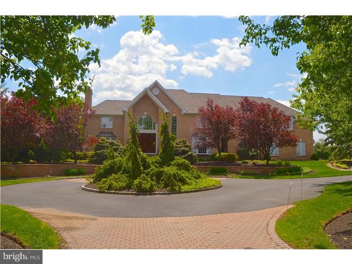 Compare to New Construction! Elegant, on premium 3 acres, thoughtful details & upgrades! Marble floor entry w/ Formal Living Rm & Dining Rm w/ detailed molding & doors to wrap-around deck. Huge gourmet Kitchen w/ high end appliances & Morning Room w/ wall of windows. 2 Story Gathering Rm. Sun Rm with terracotta floors & access to bluestone Patio. First Floor cherry paneled Office. Main Suite with tray ceiling, custom closets, Bath w/Pearl Jacuzzi tub that overlooks the lush yard, extended shower and separate Sitting Room.Four additional spacious Bedrooms all with their own Bath. Second Floor Laundry, Three Car oversized Garage. Massive Finished Walk Out Lower Level with storage, three full rooms, fireplace, Bedroom & Full Bath. Entire yard with upgraded landscaping and hardscaping and pool truly complete this wonderful estate.