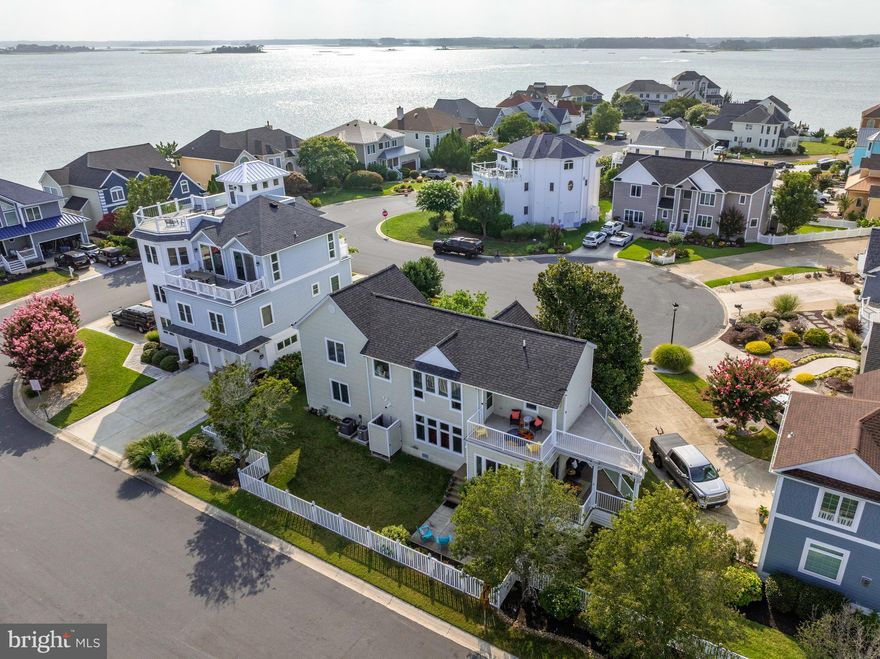Welcome to this rare opportunity to own a beautifully maintained four-bedroom, two-and-a-half bath single-family home in the coveted waterfront community of Nantucket Point. Located on a peaceful cul-de-sac, this home offers the perfect blend of privacy, comfort, and coastal charm.
Lovingly owned by the original family for decades, this residence has been the backdrop for countless cherished memories. The home conveys with a deep-water boat slip at the private, gated community pier—just a short stroll away—along with access to the community pool, making it a boater’s and beach lover’s dream.
Step inside to find light-filled living spaces, including a cozy living room with a fireplace, a charming sunroom off the kitchen, and a spacious deck ideal for al fresco dining or quiet mornings with coffee. Large windows throughout the home bring in an abundance of natural light, accentuating the warmth and elegance of each room. Outdoors, the mature landscaping offers beauty and privacy, anchored by a stunning magnolia tree in the front yard. A partially fenced backyard, paver patio, outdoor shower, and lush greenery create the perfect coastal oasis.
Nantucket Point remains one of Ocean City’s best-kept secrets—a quiet, friendly enclave hidden away in North Ocean City, yet close to everything. Whether you’re looking for a serene primary residence or a luxurious coastal retreat, this is a rare chance to own in one of the area’s most sought-after waterfront communities