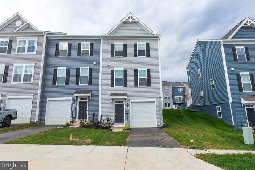 Be the first to enjoy this beautiful, new 4 bedroom, 3.5 bathroom townhome, in Charles Town's highly desirable Huntfield Community!

The main level features an open floor plan with LVP flooring and recessed lighting throughout; living area with access to the rear deck, eat-in kitchen with stainless steel appliances, granite counter tops, and large island; dining area, and half bath.
On the carpeted upper level is the primary bedroom suite with full bath, two additional bedrooms, additional full bath, and washer and dryer closet.
The lower level includes entry foyer, bonus carpeted room, full bath, and access to the 1 car garage with ample storage space. 
The Handfield Community is located just off of US-340, minutes from downtown Charles Town and WV-9.