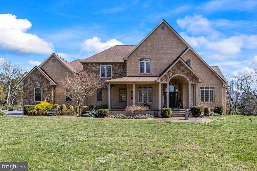 Welcome to this stunning, large brick home nestled on nearly three private acres in the heart of the country. Enjoy breathtaking views and ultimate privacy in this beautiful retreat. The home boasts a spacious floor plan with a grand family room featuring soaring ceilings, creating an inviting atmosphere for relaxation and entertaining. The chef’s kitchen is a dream, offering a large island, ample counter space, and modern finishes perfect for culinary enthusiasts. The luxurious master suite is conveniently located on the main level for easy access. Step outside to your own personal paradise with an in-ground saltwater pool, ideal for enjoying warm weather or entertaining guests. The large unfinished basement provides endless potential for customization, while the three-car garage offers plenty of space for vehicles and storage. This property is the perfect blend of comfort, elegance, and country living. Don’t miss the chance to make this your forever home!