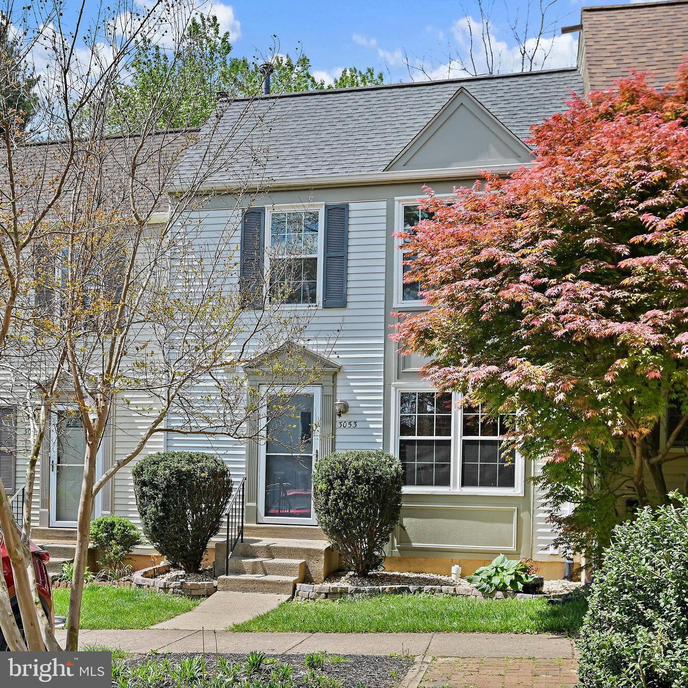 Freshly Painted with NEW Carpet, in this wonderfully UPDATED Townhome overlooking community "Pocket Park" with brick patio, park benches & majestic Japanese Maple at the end of Braxton Wood Ct!Upgraded features include; Gas Hot Water Heater WITH expansion tank (2025), Exterior Trim Paint (2025) Deck stained (2025), Stainless Steel Fridge, Gas Range, & Microwave Oven (2024), Roof replaced 2019, Kitchen and Baths Remodeled 2017-2018. Each upper level BR is a Suite w/private Bathroom & Closets with custom Closet Organizers. Kitchen w/Island, Quartz Counters, all Stainless Steel Appliances, Custom Cabinetry with under cabinet lighting, ceramic tile floors and custom Top Down/Bottom Up Blinds! Walkout from Dining Room to HUGE 20'x 17' Deck backing to Trees! Recessed Lighting on Each Level, Hardwoods throughout main level, new carpet U1, L1, and stairs! PLENTY OF STORAGE in 19'x10- storage/utility room plus additional storage under basement stairs! Gas Heat! Wood-burning Fireplace in 20'x19' Rec Room! 1 SHORT Mile to Vienna Metro AND I-66, 0.4 miles to Pan Am Shopping Center, 1.5 Miles to Mosaic District Retail/Restaurants/Entertainment!