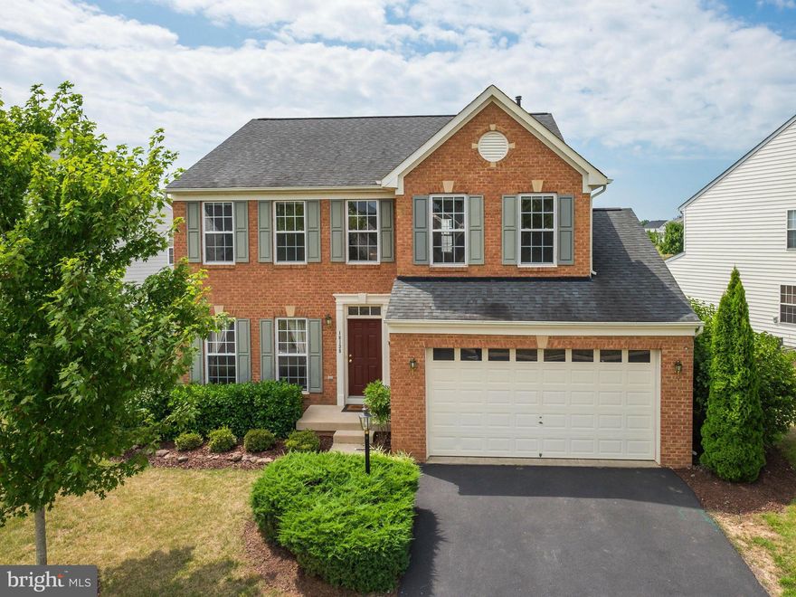 One Of The Lowest Priced Homes In All of Gainesville!  Brick front 4 bedroom home features 3 finished levels, generous sized bedrooms, a morning room extension, composite deck, fully finished basement with rear walk up exit, and more.  Neighborhood features great amenities with an outdoor pool, clubhouse, workout center, and parkland. Almost 4,000 fin sq ft - Desirable School Cluster