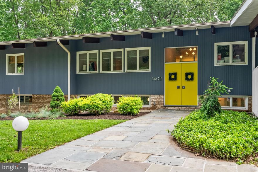 **Offer deadline has been set for Friday, May 23rd at 1pm**

Discover timeless architecture and modern luxury in this privately sited mid-century modern home, nestled on 1.32 acres of wooded serenity in the coveted Hampton neighborhood of Towson.  Surrounded by natural splendor, this residence offers the rare combination of privacy, design, and functionality.  The light-filled main level welcomes you with an open floor plan, soaring vaulted ceilings, wood burning fireplace, and window lined walls that create the feeling of indoor and outdoor living.  The heart of the home—a sleek kitchen with upgraded induction cooktop—flows effortlessly into a living area, spacious screened porch, and expansive deck overlooking the lush landscape and saltwater pool (converted and upgraded with heating feature). Whether enjoying morning coffee or evening sunsets, the panoramic views never disappoint.  The fully renovated primary suite is a true retreat with a private deck, and featuring a spa-inspired ensuite bath with dual-sink floating vanity, terrazzo tile floor, glass stall shower, and custom built-in shelving.  The lower level is exuding with thoughtful updates, including handsome built-in shelving and media center, a retro-style wet bar, and a beautifully renovated full bath with dual vanity, tiled flooring, and walk-in glass shower serving two spacious secondary bedrooms.  Lower level is lined with windows on either side, that flush the space with natural light.  Step out to your rear patio, where the chef in you can enjoy al fresco cooking and dining.  With direct access to Loch Raven’s scenic trails from the far end of the yard, this one-of-a-kind home offers a seamless connection to nature, design-forward living, and everyday convenience—just minutes from downtown Towson and major commuter routes.  Roof 2019.