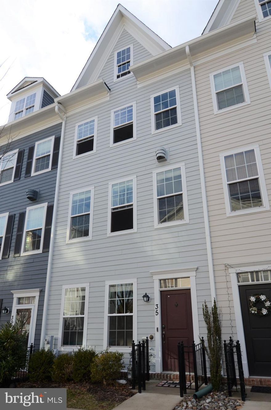 Almost new townhome in the heart of Towson! Entry level den/office. Open main level fam rm/dining/kitchen with wood floors. FP in fam rm. Large kitchen w/island - granite and stainless.MBR w/walk in closet. 2 additional BRs/baths. Balcony off kit and top floor BR. Large attic storage. 2 car garage. W/D on bedroom level. Close to all Towson amenities.