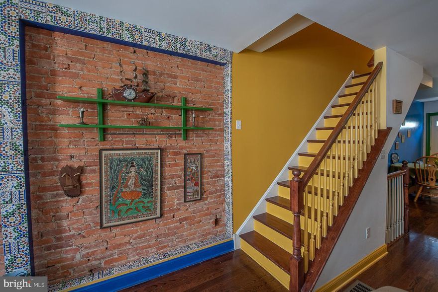 Introducing not a  just home but a pleasurable feast for your eyes located in the heart of Newbold.  This unique and art filled home is a one of a kind experience and has every amenity and comfort  that you need.

A very spacious 3 story home is easy to fall in love with especially with the incredible natural light and beautiful color palette scheme,  it is drenched with hand crafted Moroccan tiles and exposed brick accent walls that just pop, gorgeous living room and dining space with mahogany hardwood floors,  reset lighting and great ceiling height that just flows perfectly.  Open Chef's Eat in kitchen that has a bonus side café counter that is wonderful  for entertaining guest while you prep your dinners,  kitchen also includes sleek granite countertops, intricate backsplash, chocolate mahogany wood cabinets and stainless steel appliances, the kitchen is a wonderful space for your gatherings and it flows lovely with your private backyard patio garden which is also perfect for your summer BBQ's.  Beauty and color bring you to the 2nd level which is home to 2 very spacious bedrooms with gorgeous hardwood floors,  intricate built in bookshelves, pocket doors  and closets, these two rooms are so peaceful yet are bold with color and substance, one can also be used as your own personal study or office, there is also a private laundry room with stackable washer/dryer and a cool full bathroom with a cool twist on pop art custom walls,  sleek ceramic and glass tile finishes as well.
3rd floor Master bedroom is awesome and includes a beautiful master bed made from reclaimed barn wood from Lancaster county so is the shiplap accent wall ! Master also includes a great roomy walk-in closet and a gorgeous huge spa bath with a double shower heads ,  double vanity sink , enclose glass shower, porcelain tile and stone pebble shower floors. The master bedroom easily flows out to a peaceful balcony its so great for reading your favorite book and unwinding from your day,  we also have  balcony wrought iron stairs that lead you to the rooftop , a new roof was  completed  in 2020 with Tpo waterproof material and  is "deck ready"  the views are amazing  and is ready for you to complete.  We also have a clean finish basement with central air and  updated mechnicals!!  I love the location .. you are sitting perfectly between all the action and culture this city has to offer! located in the heart of Newbold you are within 2-3 blocks of all the great cafes and restaurants, Hardena, Hive coffee, South Philly Tap room, Circle Thai express Batter and Crumbs Vegan bakery, and that's only in Newbold! you are only 2 blocks away from Passyunk Square , 1 block from the Broad street subway line, you can walk or bike anywhere, no need for a car in this location.. Come experience city living at its ultimate best with this unique  one of a kind home.