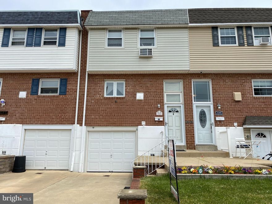 Great solid townhome on a prime block in desirable Morrell Park ! Dont miss out -  Newer roof ( 2years) , Heater ( 3yrs) , newer cement front .  Hardwoods under carpets 2nd ansd 3rd floors . Updated hall bath with ceramic tile floor , tub enclosure . 3 nice bedrooms with hardwoods and 3rd br with newer wall a/c unit .  Clean functional kitchen with gas cook top and wall oven . Large dining room with carpets and chandelier . Middle steps separate the living room and dining room . Finished basement with exit door to rear yard , cement  patio and fenced lawn . Garage with inside access , newer garage door . Laundry hall . Basement powder room .