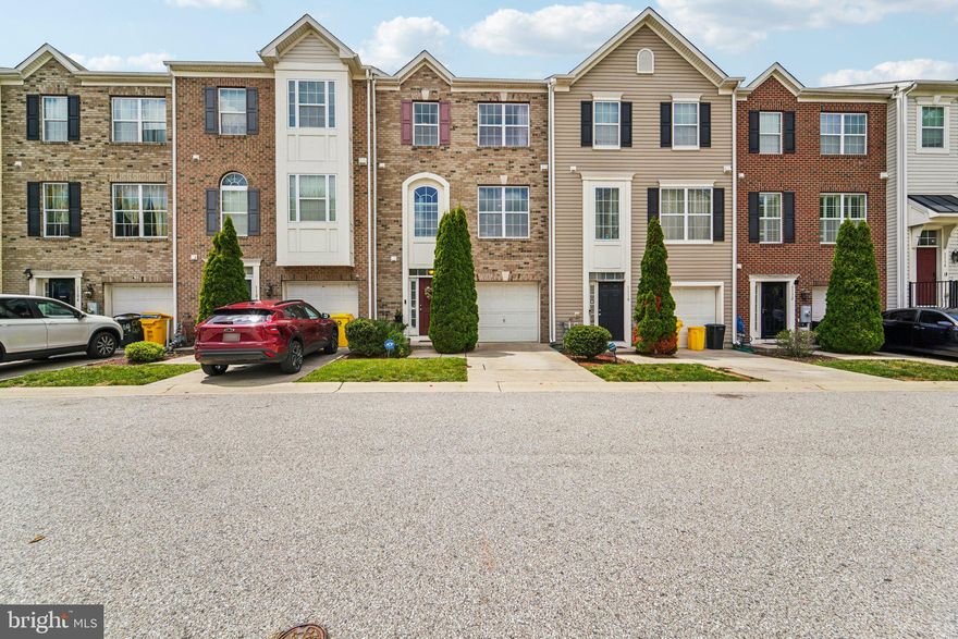 Price Improvement...Welcome to this beautifully maintained three-level townhome in Glen Burnie! Step inside to find a spacious entry-level rec room with walkout access to a fully fenced backyard. The entry level is the perfect space for gatherings, movie nights, and relaxing. The main level showcases an open-concept layout with gorgeous hardwood floors and a stunning kitchen featuring granite countertops and stainless-steel appliances. Just off the living room, enjoy the expansive deck complete with a retractable awning for shade and comfort. 

Upstairs, you'll find three inviting bedrooms, including a luxurious owner's suite with an en suite bath and custom walk-in closet. For added convenience, the laundry is located on the top floor. Additional creature comforts including a one-car garage and private driveway. 

Ideally located just minutes from I-97, offering quick access to Baltimore, Annapolis, BWI, and Fort Meade.  This home is turnkey, beautiful and convenient.