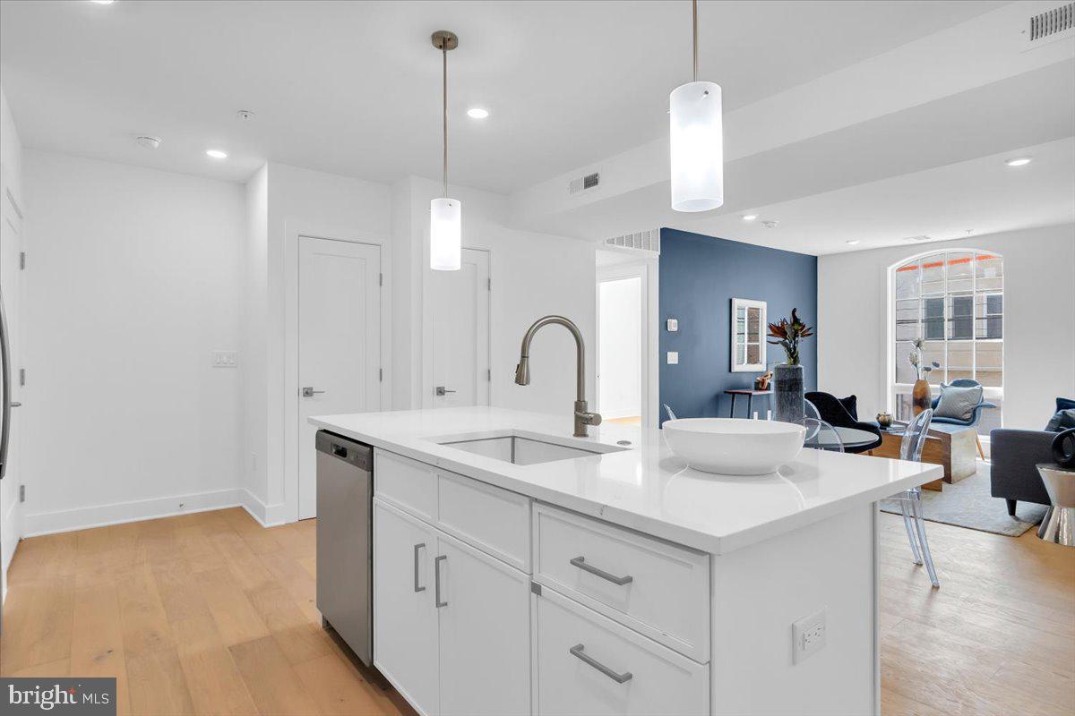 Welcome to The Beverly, a stunning new development consisting of 15 spacious 2 and 3-bedroom condos built by Lily Development, located in the highly sought-after Meredith School Catchment in Bella Vista. The building's handsome brick façade and arched windows add to its charm and character. The Beverly offers numerous amenities, including a secure entrance into the lobby for residents and package deliveries via keyless entry system. You'll also enjoy a gym/yoga studio and an elevator to all floors, including the basement. The units at The Beverly will feature timeless, thoughtfully designed Finishes. All condos are equipped with a washer/dryer. This location is unbeatable, allowing you to walk everywhere and experience all that Bella Vista has to offer. Experience luxury living at The Beverly, where every detail has been thoughtfully designed to provide the ultimate living experience in the heart of Bella Vista. Parking available at 10th & South St at the Acme. Seller to pay one year for one parking spot with an acceptable offer. The parking space must be noted on the agreement of sale.Taxes are not $1 and are TBD. Tax abatement is approved. It is the responsibility of the buyer to have taxes and square footage verified. Even though this is a new condo building, the Sellers preferred lender has 30 year fixed 5%-10% down mortgage products for this building. Please inquire with the listing team. Photos are of a similar unit within the building. The PAR Standard Agreement of Sale for New Construction of sale must be used for new construction properties whether completed or not.