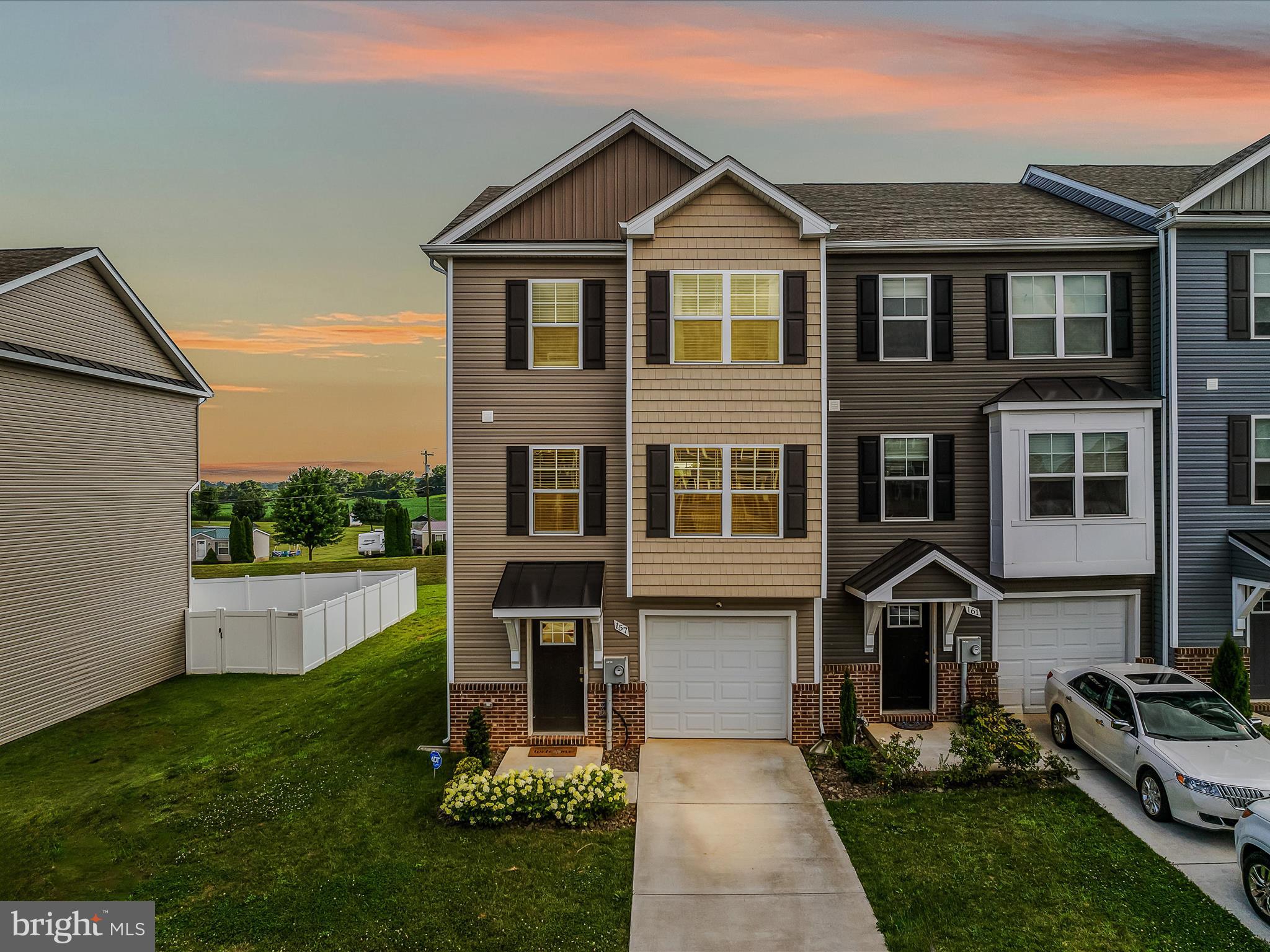 Modern End-Unit Townhome – Move-In Ready at $299,900!
Welcome to 157 Carnes Way, a stunning 4-bedroom, 3.5-bath end-unit townhome in the highly desirable Communities of Burwell. Built in 2022, this home blends modern design, energy efficiency, and space for everyone—all at an incredible value.
Why You’ll Love It:
Spacious layout with nearly 2,000 sq. ft. of finished living space
Chef’s kitchen featuring 42" soft-close white cabinets, granite peninsula with high/low bar, stainless steel appliances, and oversized island—perfect for entertaining
Bright, open main level with large living area and convenient half bath
Luxury primary suite with cathedral ceiling, walk-in closet, and spa-inspired bath with double vanity and walk-in tile shower
Private lower-level retreat with a 4th bedroom, full bath, and backyard access—ideal for guests or a rec room
Smart storage with single-car garage (app-enabled opener) and additional storage space
Upgrades throughout: LED recessed lighting, ceiling fans, pre-wired TV outlets, and award-winning
Best in Class WV energy rating
Outside, enjoy a low-maintenance lot with HOA fees under $21/month covering common area and road maintenance.
Big Savings & Smart Buy:
At just $299,900, this end-unit is priced to move—offering instant value in today’s market.
Don’t Wait!
Homes in this neighborhood do not last long—and with this price, location, and condition, 157 Carnes Way is expected to sell quickly. Schedule your showing today before it’s gone!