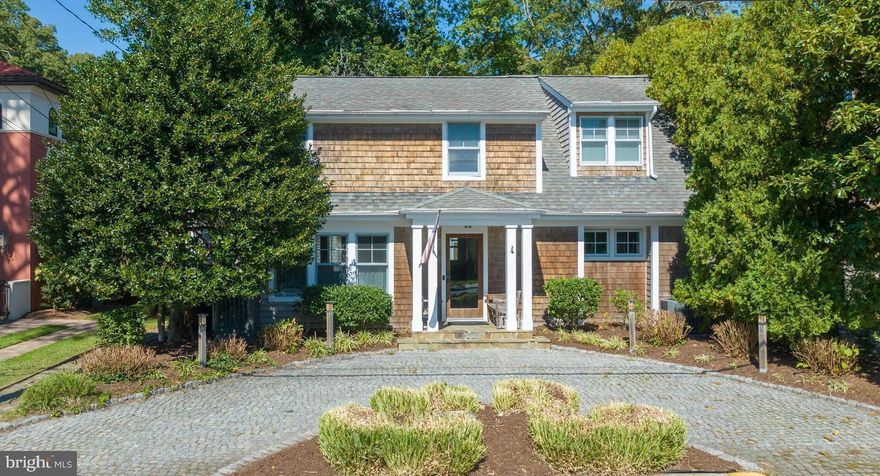 Spectacular home on sought-after Sussex St. nestled in the heart of Rehoboth! 3 units on one property! Merely 2 ½ blocks from the beach this 7 bedroom/6 bath classic home…including charming 2 Bedrooms/1 bath fully equipped cottage and 1BR/1 bath guest suite…is completely walkable and bikeable to delightful beach town that is chock full of fine dining, trendy boutiques, casual eateries and shops, family-friendly boardwalk and gorgeous beach. Nearby to hub of Rehoboth Beach, the beauty of this home is to park your car, put away your keys and enjoy beach living at its finest year ‘round! Incredible rental potential as well! Semi-circle paver driveway leads up to 4 columned, elevated front entry with benches on either side and cedar coastal cottage-style 2 level striking home. Lovely landscaping and mature-aged trees envelope property and simultaneously provide privacy and shade. Appreciate extensive use of exceptional millwork including triple-width crown molding, elegant chair rail and well-crafted build-ins, glorious Palladian windows, large skylights, decorative columns, mix of hardwoods/ceramic tile flooring and more throughout home. Great room sits to front and is spacious and bright with triple windows, rich hardwood floors, and sun-touched yellow paint, making room seem even larger and lighter.  Renovated kitchen boasts rich cabinets that are highlighted by earth-hued granite countertops, while ceramic tile floor anchors room and SS appliances offer modern accent. Trio of built-ins grace above refrigerator and countertop is extended to create casual breakfast bar with tuck-under stools that is open to enchanting breakfast nook, where French doors allow natural light to stream in meanwhile offering easy access to screened-in porch. Dining Room is accommodating  enough for a large dining table and chairs along with accessory pieces for ceramics and glassware storage. 3 windows bring in natural light and flushed columns add dimension. All set the tone and are flawless backdrop for entertaining. This room is perfect combination of just enough elegance for fine dining, yet ideal for informal gatherings of beach friends and family. Enjoy access to stone patio that offers sun-filtered outdoor space and perch for unwinding.
Upper level showcases primary Bedroom with vaulted ceiling, ample space and natural light. 4-pane glass
accent adorns DD entrance into full bath of granite-topped vanity with build-ins, all-tile shower and
pocket door to private water closet. Lavish! Secondary Bedrooms have beatboard, hardwoods and seashore
accents. Generous screened-in porch features vaulted ceiling/skylights, angled wood floors and all
windows, great for morning beverages, afternoon lemonade, evening drinks and beyond to grilled
dinners and weekend BBQs! Also, note outdoor shower. Bonus space is well-designed cottage that is
picture perfect accommodations for rental or enjoy extended family and friends, allowing close access
for spending time together, while also permitting privacy and peacefulness for all parties. Lush
landscaping edges cottage that is tucked behind main home with patio in between. Ceramic tile floor
foyer adorned with sofa table opens to an appealing conversation area of driftwood-style floors, dining
spot tucked beneath 2 windows, full kitchen, roomy bedrooms and full bath. Take advantage of this prime
location and relax and recharge in this amazing Rehoboth Beach retreat!