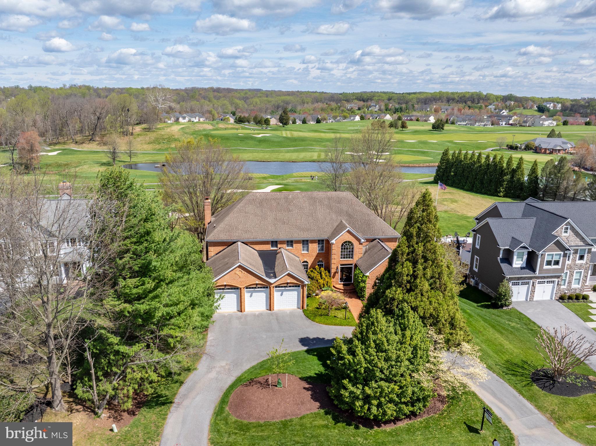 Experience luxury living at its finest in this stunning brick exterior colonial nestled in the highly sought-after community of Cattail Creek. Boasting optional amenities such as a picturesque golf course just steps from your back door with views of the 10th, 16th, 17th, and 18th holes, a lavish clubhouse, and a refreshing pool, this residence offers a lifestyle of unparalleled indulgence. As you step into the grand foyer, you are greeted by soaring ceilings that allow natural light to pour in through the exquisite Palladian and transom windows, guiding you past the elegant curved staircase and into the heart of the home. The dining room exudes sophistication with double crown molding, chair railing, box wainscoting, and beautiful hardwood floors that flow seamlessly throughout. The gourmet kitchen is a chef's dream, featuring quartz counters, 42" cabinetry, a stylish backsplash, a breakfast bar, cabinet lighting, a center island, high-end appliances, pull-out drawers, and stainless steel appliances. Adjacent, the family room beckons with plush carpeting, cathedral ceilings, a cozy brick wood-burning fireplace, and access to the deck, mud room, powder room, and convenient three-car garage. For those who work from home, the office offers a serene retreat with built-in bookcases, custom blinds, and a gas fireplace. Additionally, the den/living room boasts impressive 10-foot ceilings and stately columns, perfect for relaxation or entertaining guests. Retreat to the main level primary bedroom suite for ultimate relaxation, complete with a second gas-burning fireplace, plantation shutters, cathedral ceilings, two walk-in closets, and a luxurious ensuite featuring a double vanity, walk-in shower, and indulgent jetted soaking tub. Upstairs, four spacious bedrooms await, each adorned with plush carpeting, ample closet space, and access to dual entry baths, with one bedroom featuring a coveted walk-in closet. The expansive lower level offers endless possibilities, with plush carpeting, stately columns, access to the rear patio, a versatile bonus room or potential bedroom, a full bath, and ample storage space. Conveniently located near major commuter routes including I-95, I-270, MD-32, MD-29, and I-70, this exquisite residence offers both luxury and convenience in one unparalleled package. Don't miss your chance to call this exceptional property home. Schedule your private tour today!