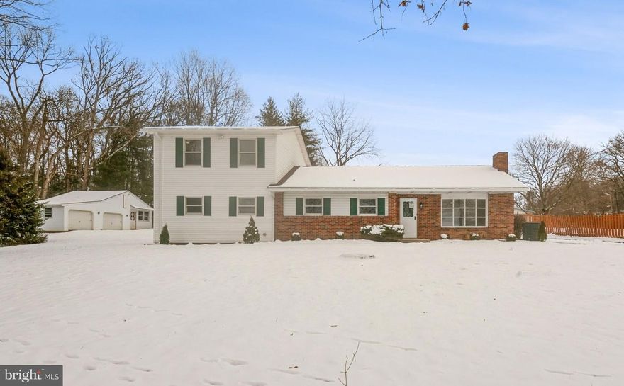 Welcome to your idyllic retreat in Hampstead, MD! This charming single-family home, nestled on a sprawling 1.88-acre lot with picturesque farm views, is a true gem of suburban living. Built in 1964, this residence seamlessly blends classic charm with modern updates, offering 2200 sq. ft of tastefully designed living space.
Step inside to discover a recently updated interior that exudes warmth and sophistication. The living room, adorned with a cozy fireplace, and the versatile gathering room with French doors to the backyard provide the perfect spaces for relaxation and entertainment. The heart of the home, a brand-new kitchen with sleek cabinetry and top-notch appliances, opens to a covered patio—a delightful spot for al fresco dining.
With 4 bedrooms and 3 baths, this home is tailored for comfort and convenience. Freshly painted walls and new flooring add a touch of luxury throughout. The 1080 sq. ft unfinished basement offers endless possibilities.
Outside, a vast backyard beckons, providing a private haven for play and relaxation. A 2-car detached garage and workshop/outbuilding add practicality to this dreamy property.