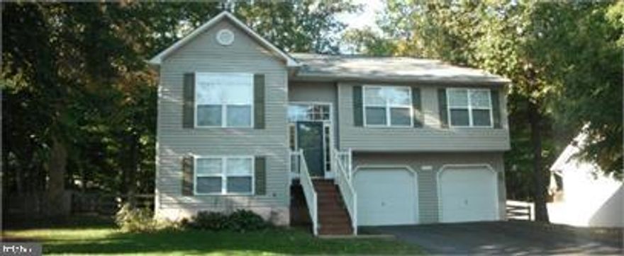 Just minutes from Fredericksburg! Pristine split level 3 bedroom 2 bathroom single-family home in Oakland Park in King George County. This home features a bright front living room with wall to wall carpet. Country kitchen with large pantry. Dining room opens to deck overlooking fenced yard. Two car garage. Shed on property for ample storage! Beautiful wooded lot! Located just across the county line from Stafford County. (Listing photos taken prior to occupancy of most recent tenant).