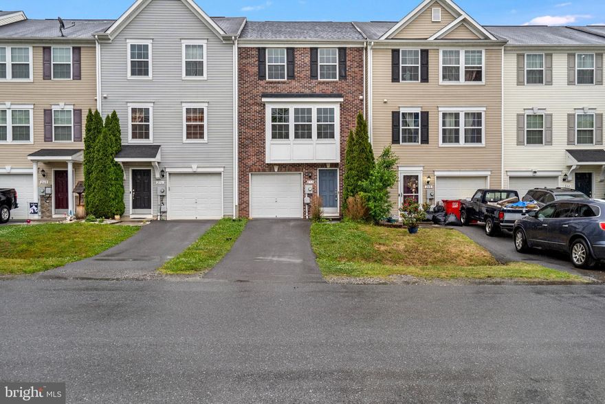 Wow just redone like new. Home features a brand new roof and HVAC system. New floors and paint throughout the home. Home has a large bumpout giving you extra room on each level of this 3 level townhome. The downstairs features a large living room area. On the main you will find a large living room, kitchen with granite countertops and dining room area as well as a powder room. Upstairs you have 3 bedrooms and two full baths.