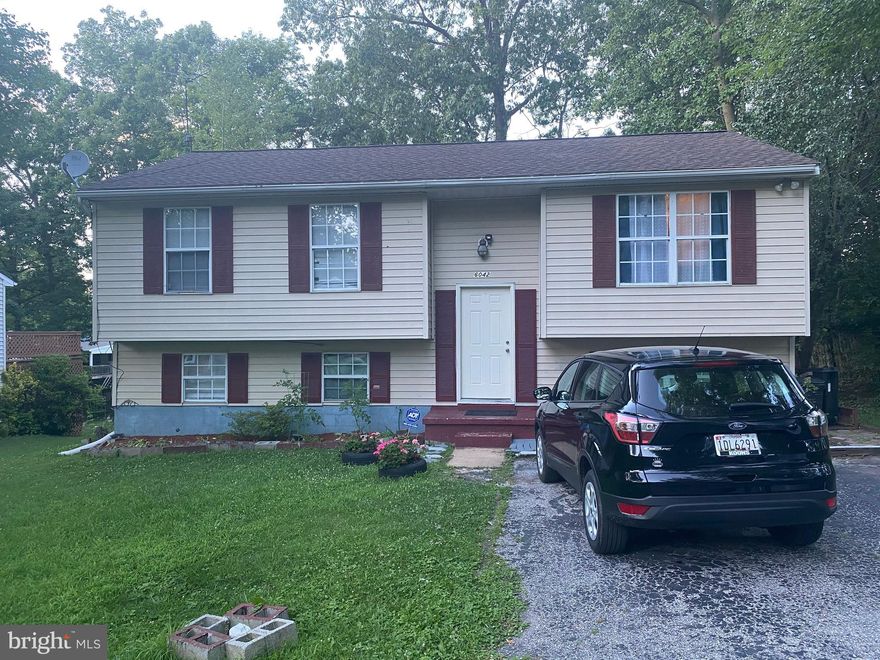 Great Split foyer offered a Double -deck complete lower level w/4th bed room & Full bath. Newer Roof  2019, new dryer , washer, newer water heater , and much more. Sliding glass doors to deck.Laminate hardwood floors. Great location.