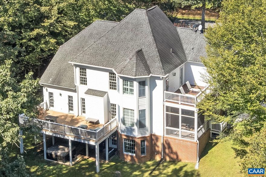 Beautiful brick Contemporary Colonial on 2.05 acres in sought-after Bentivar! This light-filled home offers multiple indoor & outdoor entertaining spaces, including a 2-story Great Room, large deck & screened porch overlooking the private yard. The library features custom built-ins, while the incredible owner?s suite boasts a tray ceiling, bay window sitting area with newly refinished private deck, spa-like bath, & an expansive walk-in dressing room. Hardwood floors flow throughout the main & upper level, with a Jack & Jill bath upstairs. The terrace level provides a family room, game room with wet bar, bedroom, full bath, exercise room & abundant unfinished storage. With a 2 car garage, fenced garden spot, & shed/Chicken Coop, this home has it all! No HOA. Recent updates include resurfaced driveway, new water heater, washer, dryer, refrigerator, & septic pumped, all within 3 years. Don't miss the additional storage in Bedroom 3's eaves. Only minutes away from everything Charlottesville has to offer, but feels like a private oasis!,Maple Cabinets,Solid Surface Counter,Fireplace in Great Room