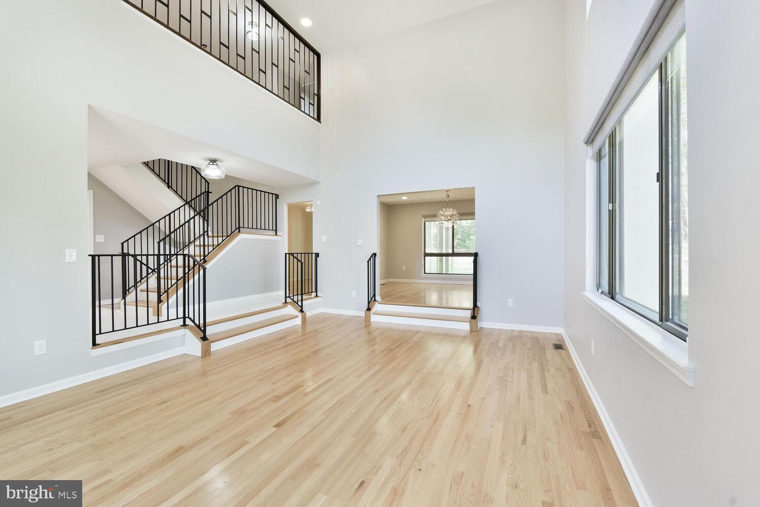 Experience Timeless Elegance in the Heart of Potomac Village!
Welcome to this stunning, newly renovated 4-bedroom, 4.5-bath luxury home tucked into a quiet, highly coveted neighborhood of Potomac Village just minutes from the shops and dining of Potomac Village Shopping Center and a short drive to the scenic trails of Great Falls National Park & the C&O Canal. With an abundance of natural light streaming through every level, this home is a masterpiece of comfort, design, and refined living.
At the heart of the main level is a beautifully appointed kitchen designed to delight both everyday cooks and seasoned hosts. Outfitted with brand new stainless steel appliances, quartz countertops, a generous center island, crisp white wooden cabinetry, a walk-in pantry, and a deep stainless steel sink with a sleek motion-activated faucet, it’s a space where form and function meet in harmony.
The main floor features a grand sunken living room beneath dramatic two-story ceilings, a formal dining room, a bright home office, and a quaint breakfast area. The family room invites cozy evenings by the gas fireplace, while the sunroom, finished with engineered hardwood flooring, provides a serene space to soak in the daylight year-round. A main-level laundry room adds practicality and features a large walk-in closet for added storage and ease, while the spacious two-car garage keeps your cars in great condition and makes it easy to bring groceries home.
Upstairs, the Master Suite is a light-filled sanctuary with an expansive two-person walk-in closet. The ensuite bath offers spa-level luxury with a soaking tub, rainwater shower, and elegant tile finishes. Three additional large bedrooms, each with ample closet space, are served by two beautifully finished full bathrooms featuring walk-in showers, designer tile, and water-saving toilets.
The fully finished basement level expands the home’s possibilities, offering engineered hardwood floors, a custom wet bar with abundant storage, and a charming wood-burning fireplace. A bonus room with a walk-in closet can serve as a game room, gym, or guest retreat. This level also includes a full bath with a walk-in shower, a stunning large cedar closet, and exceptional storage with a crawl space and under-stair access. With ingress and egress, a dedicated utility room, new HVAC system, new water heater, leak sensors, and a modern sump system, the home offers comfort and peace of mind for years to come.
Outside, enjoy the beauty of front and rear patio spaces perfect for morning coffee, al fresco dining, or entertaining under the stars.
Throughout the home, you’ll find thoughtful upgrades such as a Vivent security system, Ring doorbell, ceiling fans in multiple rooms, engineered hardwood flooring in the basement and sunroom, and brand new interior door hardware that adds a refined finishing touch. Hardwood floors grace the main and upper levels, enhancing the warm, welcoming feel that carries through every room.
With its combination of timeless charm, modern luxury, and unbeatable location, this home offers a rare opportunity to enjoy luxury home living in one of Potomac’s most desirable neighborhoods.