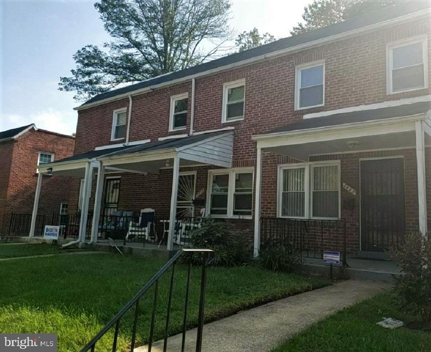 You'll love this home this spacious 3 bedrooms 2 baths town home with pergo style hardwood floors (entire first floor). Fully finished basement with entertainment area, full bath and ample laundry/storage room. Upgraded galley kitchen with wood cabinetry, stainless steel appliances, granite countertop and access to back yard. Enjoy socializing in the formal Dining Room conveniently located right off the kitchen. The upstairs features 3 bedrooms, family style with 1 full bathroom. FRESH Paint. Fenced backyard. Great location - within minutes to public transportation, I-695 and schools.