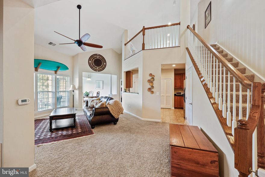 Discover this rarely available 3rd floor unit that stands out with its soaring vaulted ceilings, cozy fireplace, and an additional loft space ideal for a home office or recreation room. Boasting 2 generously sized bedrooms and 2 full bathrooms, this condo features an open floor plan that feels much larger than its listed square footage. The primary bedroom suite offers an attached bathroom with a dual vanity, a large walk-in shower, and large walk in closet plus additional closet for ample storage. One of the standout features of this unit is the deck that overlooks serene trees, providing a peaceful retreat unlike other units that face the parking lot or road. The building is equipped with interior stairs and an elevator, allowing you to enjoy top-floor living without the hassle. Experience maintenance-free living in a community that offers a clubhouse, exercise room, pool, and more! Monmouth Meadows is conveniently located near a variety of restaurants, stores, library, Harford Glen Park and easy access to I-95. Don't wait to schedule your private tour!