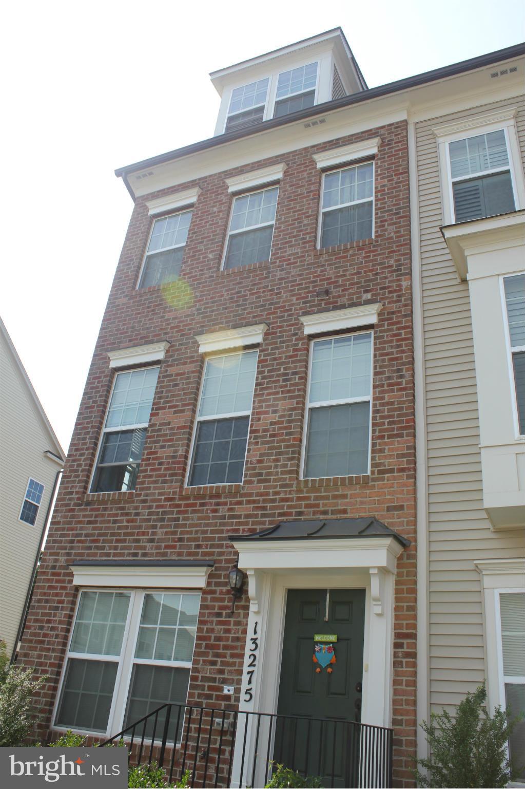 Like New!IMPROVED PRICE! Spacious townhouse/condo brick front end unit w 4 lvls. Rear garage w/ driveway parking. Deck off kitchen. Bright and open floor plan. Great storage space and closets.(see floor plans under documents). Located near all major routes, transportation, shopping and entertainment. Plenty of parking for visitors. MOTIVATED SELLER SHOWS LIKE A MODEL!