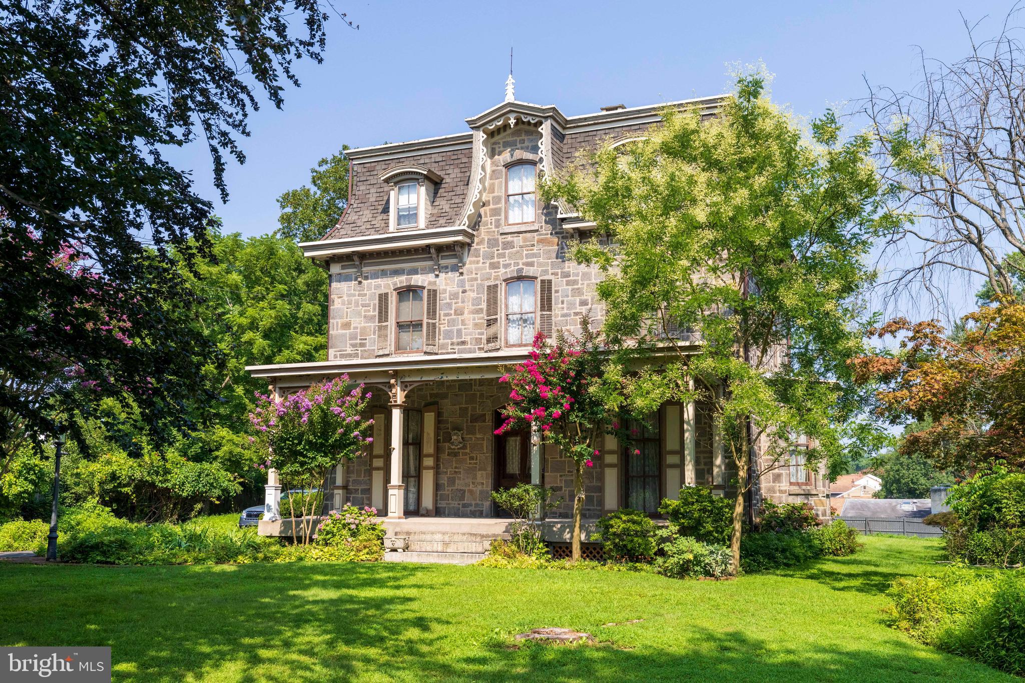 Step into a timeless treasure—a one-of-a-kind 1840 Victorian estate with an extraordinary historical pedigree. Built by Thomas Rowland, for whom the street is named, this architectural gem sits on land originally granted by William Penn himself, the very founder of Pennsylvania. Once part of a sprawling three-acre estate with two outbuildings, this remarkable home now rests on .82 acres of beautifully preserved grounds.
A true Victorian masterpiece, this residence showcases a traditional floor plan adorned with 12-foot ceilings, intricate crown moldings, and gracefully rounded corner walls—hallmarks of 19th-century craftsmanship. The grand foyer welcomes you with a mahogany staircase and original banister, leading to six spacious bedrooms and three full baths, including a convenient first-floor full bath.
The formal parlor, just off the main entrance, is a showstopper, featuring an elegant marble fireplace, perfect for gatherings or quiet evenings by the fire. Sunlight pours through high arch-type windows, illuminating the home’s original hardwood floors. The mansard roof, adorned with intricate Victorian woodwork, further enhances this home’s stately presence.
Modern comforts blend seamlessly with historic charm, as the home is equipped with updated heater and central air via a high-velocity, energy-efficient system. The primary suite boasts a clawfoot tub, offering a luxurious retreat. Spacious room sizes, exquisite details, and an unmistakable grandeur define this historic residence.
With only five other families having been stewards of this architectural treasure in its 185-year history, this home stands as a true testament to desirability, craftsmanship, and legacy. Don’t miss this rare opportunity to own a piece of Pennsylvania history in the heart of Cheltenham.
Schedule your private tour today!