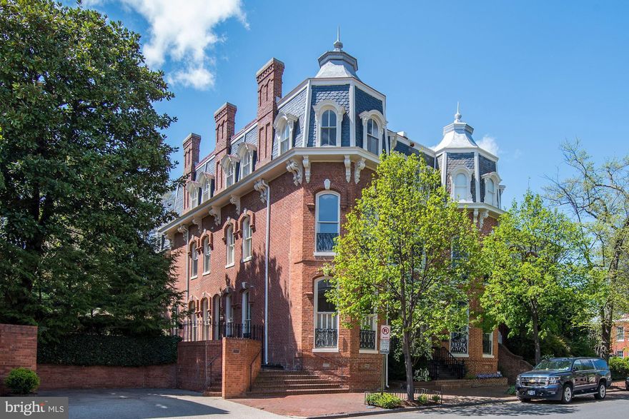 New Price! Wonderful value in Georgetown's Coveted East Village! This impressive, semi-detached 5 Bedroom, 5.5 Bath, 4,850 square foot home has dramatic ceiling heights, spacious formal rooms, and special views. The southeast exposure fills the home with sunlight on all levels. The first floor features 12 ft ceilings, a large entry foyer, living room with floor to ceiling windows and fireplace, dining room with fireplace,  eat-in kitchen with french doors leading to the back garden, wine closet, and powder room. The second story features almost 11 ft ceilings, a large library/ family room with wet bar and built-ins, Owner bedroom suite with floor to ceiling windows, and an additional bedroom with an en-suite bathroom. The third level has almost 10 ft ceilings, three bedrooms and two bathrooms.  This property sits on a .12 acre lot with two large, separate garden areas and two car parking.