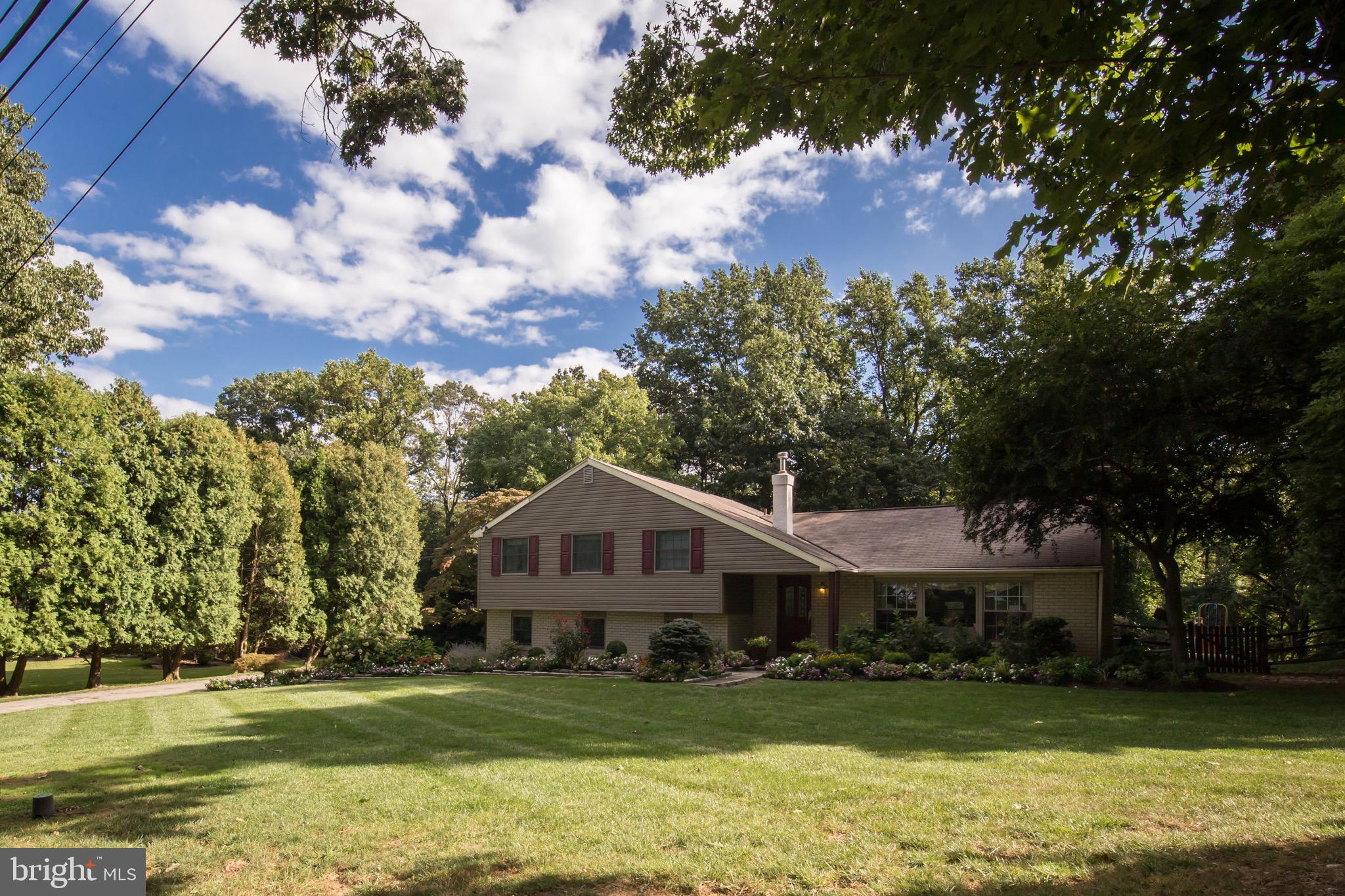 Recently converted back to four bedroom home- must see! Fabulous and renovated split level home on a quiet cul-de sac in the heart of Gladwyne.Fantastic home looking for new owners to enjoy this updated 4 bedroom /2.5 bath home with two car attached garage and beautifully landscaped .74 acre lot. The inviting first floor of the home includes a completely renovated kitchen with custom cabintry and countertops, a massive living room with bay windows and sunny dining room with refinished hardwood floors. The kitchen boasts tremendous cabinet and countertop space including a breakfast bar perfect for a few bar stools! The updated lower level of the home has a cozy den with gas fireplace, an all-season glass sunroom- both with new hardwood flooring, mudroom with custom built-ins, laundry room with Speed Queen washer/dryer and powder room. The second floor includes a nicely sized master bedroom with renovated bath en-suite, walk-in closet with custom built-ins, and fantastic natural light. Two additional bedrooms with brand new carpeting and a separate office and an updated hallway bath complete the second floor of this home. Office can be converted into 4th bedroom with minimal renovation. Additional features of this home include a new septic system (2012), hot water heater (2016), large pull-down attic with plentiful storage.