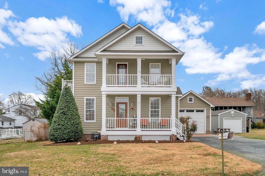 Gorgeous water view home in small Potomac River community.  The main level offers an open floorplan with hardwood floors throughout. Beautiful kitchen with huge island that opens to family room with cozy fireplace and built ins.  The main level office can also be used as a fifth bedroom if desired as there is an attached full bath.  The upper-level master bedroom suite offers two decks to sit and enjoy the river views as well as a large en suite bath with a jetted tub and double sinks.  The lower level boasts a family room with a refrigerator and sink, second fireplace, full bath, bedroom with walk in closet, laundry hook up and tons of storage.  Perfect set up for entertaining or for an in-law suite.  This home offers plenty to enjoy on the outside as well.  Relax on the multiple porches, rear deck, or in the hot tub.  The detached garage/workshop offers 750 additional sq. ft. and 400-amp electric service.  Plenty of room to keep your car, boat, jet skis or other water toys.  House is wired for a whole house generator.  Fairview Beach is a golf cart community with 2 restaurants, beaches, and a marina. If you like to boat, fish, kayak, or just relax on the beach, this lovely home will make a wonderful year-round residence or summer home.  No HOA, voluntary residents' association. AirBnB are allowed as well.