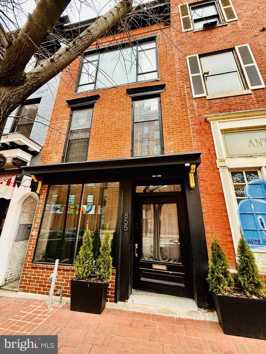 Exceptional Properties. Exceptional Clients.  A rare opportunity to truly live where you work! This fully renovated mixed-use property offers both commercial and residential zoning, ideal for professionals seeking convenience and flexibility. 855 N. Howard Street features a fully accessible commercial storefront/therapy office with a reception/waiting area w/secure door, private office, and accessible half bath. The residential entrance at 862 Tyson Street offers a gated parking area for up to four vehicles and a secluded rear patio. Completely renovated in 2022–2023, the home showcases polished concrete floors throughout the kitchen and dining areas, a chef’s kitchen with  granite countertops, center island, and abundant cabinetry, plus a spacious dining area perfect for entertaining. Upper levels include real hardwood flooring, raised ceilings and ceiling fans throughout, a luxurious living area with a gas fireplace, two bedrooms (one currently used as a gym), and a top-level owner’s suite with a second gas fireplace and ample closet space for two. All bedrooms feature en-suite baths w/ slate flooring and walk-in showers. High ceilings and oversized industrial-style windows flood the home with natural light from the front, back, and side. Major system upgrades include full security system with cameras, hardwired wifi and ethernet, brand new mini-split zoned HVAC, plus new plumbing, electrical, and gas lines. Also includes an expansive unfinished basement for storage. No detail was overlooked—see documents for the full list of improvements.