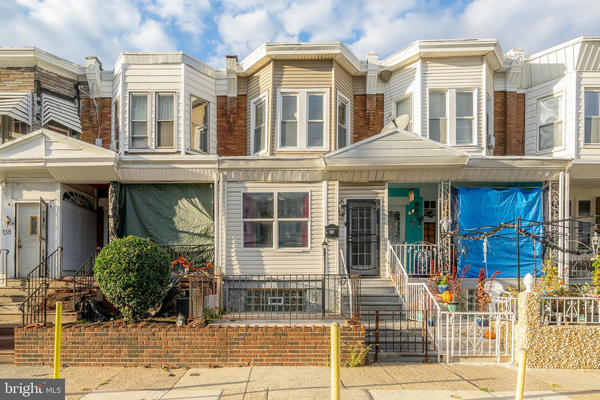 Tucked away on a low-traffic block, just off Roosevelt Blvd in Olney, you'll find 131 W Albanus St. This renovated, move-in ready home has 3 bedrooms, 2 bathrooms, a finished basement, a rear yard, and space to grow into. Out front, you're welcomed by a gated patio where you can sit on good weather days, catching up with friends and neighbors. Inside, there's an enclosed porch, perfect for a sitting room or office. Modern floors extend into the bright and airy living room, with plenty of space for hanging out. At the center of the main level, the large dining room is made for entertaining on holidays and family gatherings. At the rear is an updated kitchen fitted with shaker cabinetry, quartz counters, stainless steel appliances, and space for extra storage or a rolling cart. Out back, the peaceful rear yard acts as a retreat from the city's hustle, where you can create a garden oasis to host barbecues and dine under the stars. The home's finished basement has more living space, ideal for a gym, theater, or playroom, along with the laundry and a bathroom. Up on the second level, there's a large sunlit bedroom with bay windows and a double closet at the front. Down the hall is a full bathroom and two more bright bedrooms. 131 W Albanus St's convenient location is close to shopping centers along Roosevelt Blvd with stores like Walmart, Aldi, and Home Depot. There's also easy access to public transit, Rising Sun Ave, and Jefferson Einstein Hospital. Schedule your tour today!
