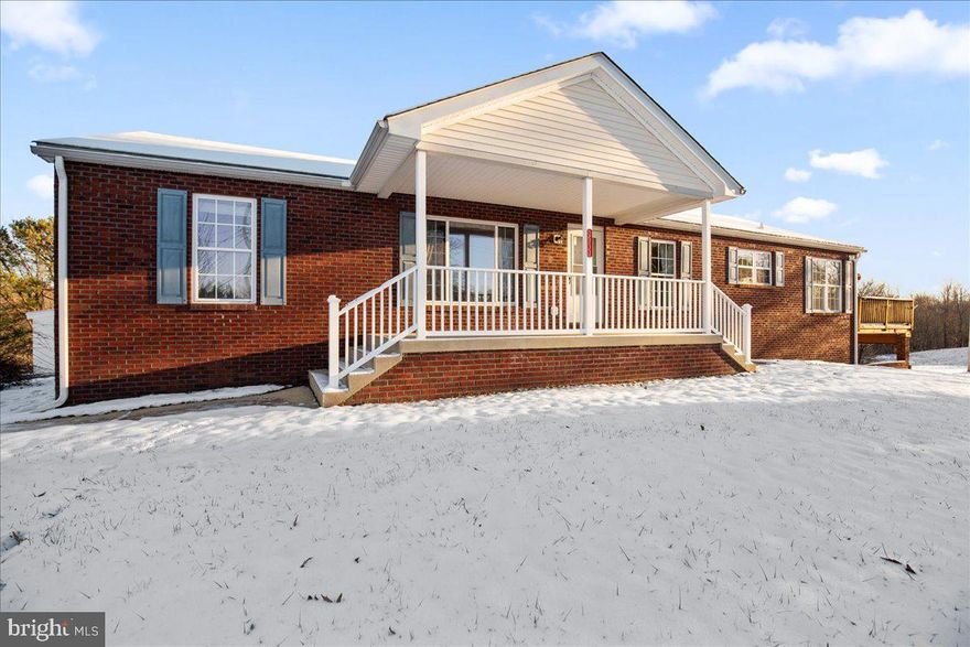 NORTHERN CALVERT COUNTY location provides country living experience within 45 minutes to the city! Carefully chosen systems during the 2002 build project included brick exterior and chimney, 2 x 6 framing, geothermal heating and cooling, also a backup generator for the home's essentials.  The roof was replaced in approximately 2021 with an architectural shingle. The home's interior is move-in ready, very clean with new carpet throughout.  Primary suite is separate and away from guest bedrooms, has private bathroom with shower and large soaking tub. The kitchen is spacious and bright with complete appliance package and ample counter space. Nearby mud room has washer and dryer, laundry sink. The family room-kitchen-breakfast areas enjoy open an flow plan for entertaining friends and family. Fireplace with stone surround and access to the wraparound decking with sun awning and farm views compliment the living space.  You will appreciate the 1820 SF  basement which includes attached oversized garage, high ceilings and room for additional improvements and storage. The unfinished basement also has toilet and sink plumbed., extra refrigerator too! Finally, the detached garage with additional shop area is fantastic!! SOLD AS IS.