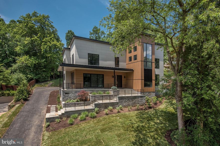 Just Completed! Cutting edge, Contemporary home by AV Architects + Builders. Over 8,200 sqft of luxury living. Dramatic Foyer w/ soaring Stair Tower flowing into the formal Dining Rm & Great Rm. Kitchen w/ European style cabinets, walk-in Pantry w/ pocket doors, outdoor covered Patio. Master Suite w/ Custom his & hers Walk-in Closets & spa-like Bath. Walk-out Lower Level.