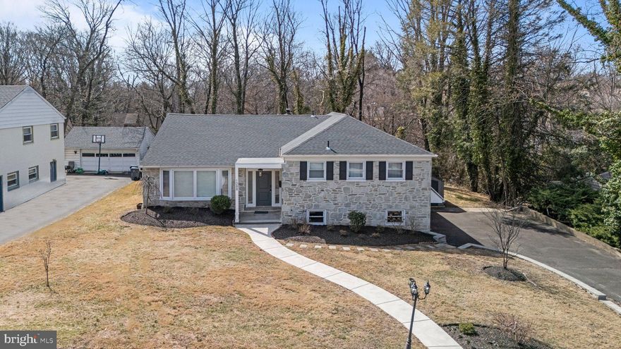 Welcome to 1088 Sparrow Road, a beautifully maintained stone, split-level home in the sought-after Jenkintown Manor neighborhood. With exceptional curb appeal, this home immediately impresses—freshly replaced curbing, a meticulously manicured lawn, and a stately front door set the stage for what lies inside.

Step into the private foyer, a welcoming space perfect for greeting guests before entering the expansive, open-concept first floor. To your left, the spacious living room features a gorgeous bay window, bathing the space in natural light. Straight ahead, the upgraded, modern kitchen boasts a fully upgraded kitchen with new cabinetry, a wall oven, quartz countertop, a spacious kitchen island, and large windows, allowing for a flood of natural light to enter. The heart of the home -- the perfect spot for gathering. The generous dining room, ideal for hosting, completes the main living space with access to the patio through sliding doors.

Upstairs, four well-appointed bedrooms await, including a primary suite with a luxurious whirlpool tub. The additional three bedrooms offer ample closet space, large windows, and plenty of room to relax. A second, upgraded full bathroom with a double-sink vanity serves this level.

The lower level is an entertainer’s dream, featuring a game room with a cozy gas fireplace, built-in cabinetry, a wet bar, and a full bathroom. The laundry room is also conveniently located here, complete with a washer, dryer, and built-in steamer.

That's not all! -- The finished basement offers additional flexible space with finished walls, ceiling, and flooring—ready to be transformed into your ideal setup. 

This home also features a side-entry two-car garage with two car-charger hookups, and a covered porch accessible from the game room, providing protection from the elements.

Prime Location! Just a mile from the SEPTA Rail Station, commuting is a breeze. Enjoy the nearby restaurants, shopping centers, movie theaters, and parks, making this a perfect location for every lifestyle.

Upgrades throughout! This meticulously cared-for home is move-in ready, with an option to purchase furniture separately.

Don’t miss this opportunity—schedule your private showing today! OPEN HOUSE SCHEDULE FOR  March 22nd AND 23rd from 1-3pm
