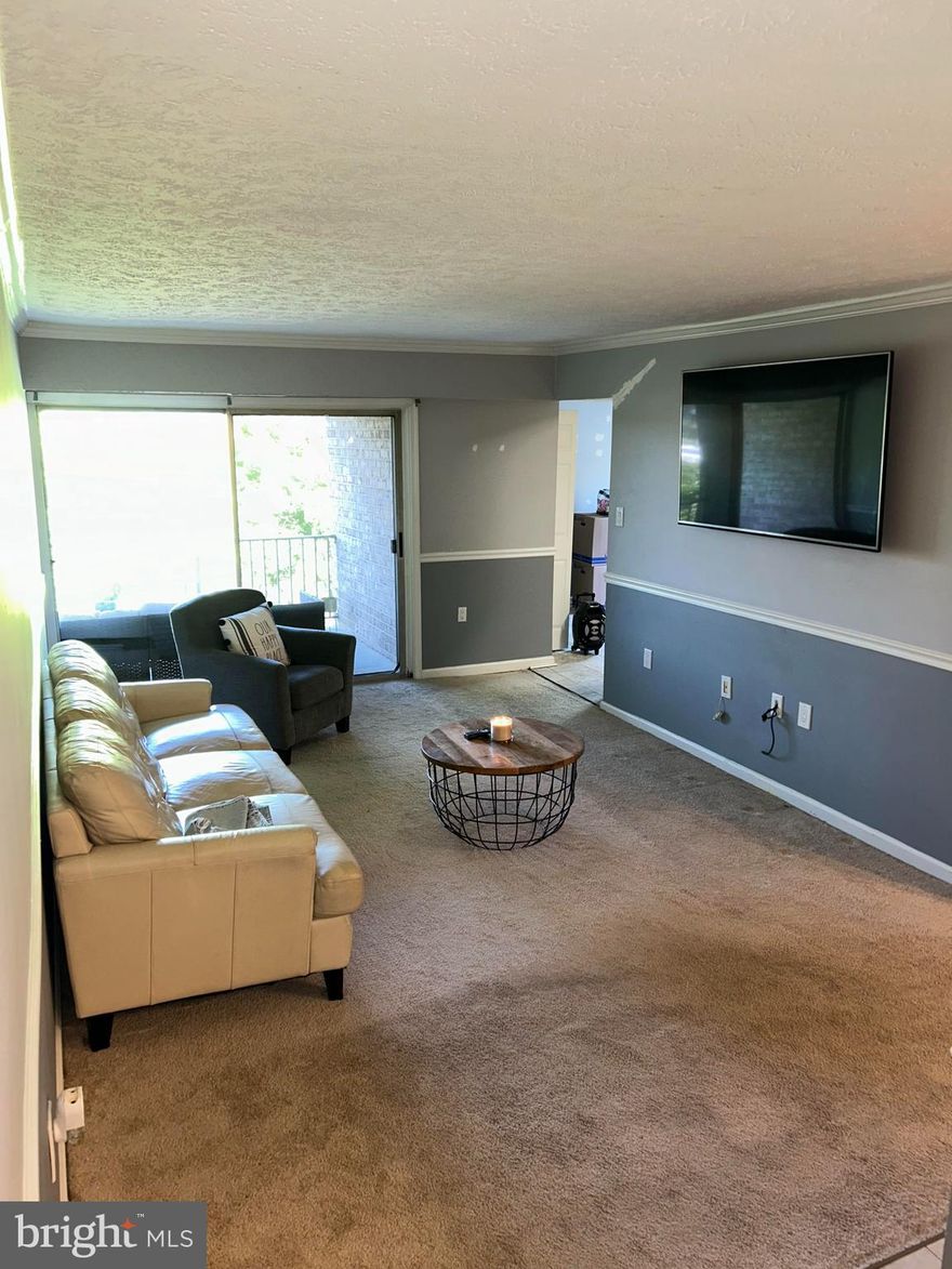 Move in ready! 2 bedroom, 2 bathroom condo in FHA approved community. This condo boasts an open floor plan with plenty of natural lighting, lots of closet space, an eat-in kitchen,  and separate dining area.  Washer and dryer in the unit. Community amenities include community room that can be used for events, tennis-court, swimming pool and playground. Walking distance to plenty of shops/restaurants/entertainment and just minutes away from the Baltimore Washington parkway and I-495. Condo fee includes all utilities -water, AC/Heating, electric, snow removal, exterior maintenance and more. Conveniently located near BW Parkway and  interstate 495 and only minutes away from Washington, DC and BWI airport.