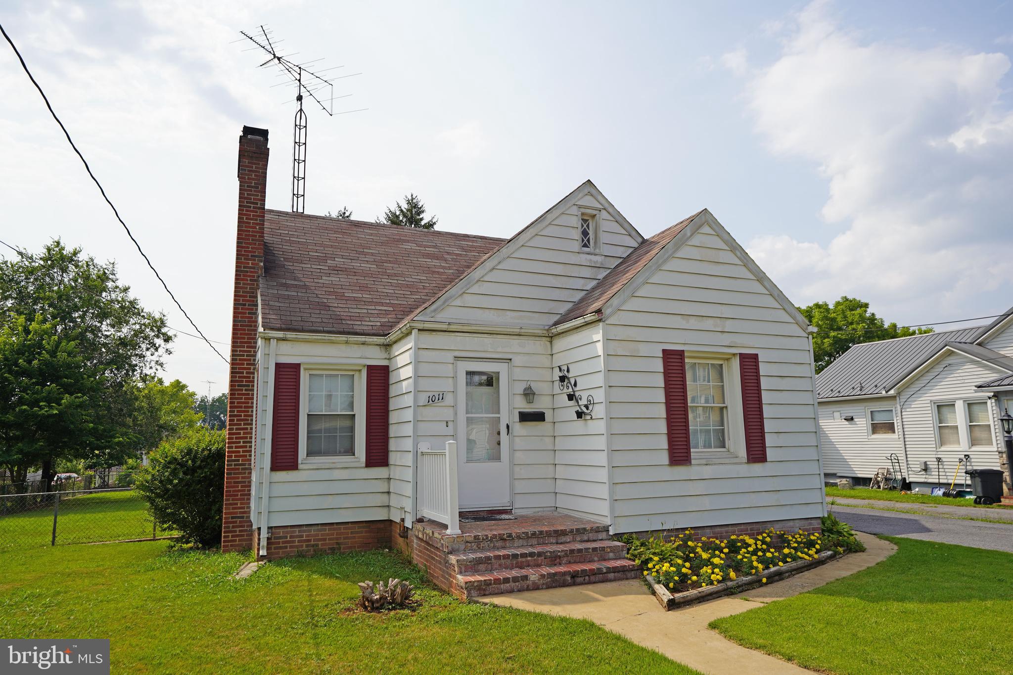 LOVINGLY CUTE! This 2 bedroom/ one bath home located near Winchester Avenue minutes away from shops, grocery and I-81. In good condition hardwood living room, dining room with two corner cabinets and bedrooms. Kitchen with backsplash, floored attic a storage or additional living area. Basement has a shop, laundry area, storage space and stairs to rear access. One detached garage with ceiling storage space. Nice level yard with fencing. Don't wait, see it today!!
