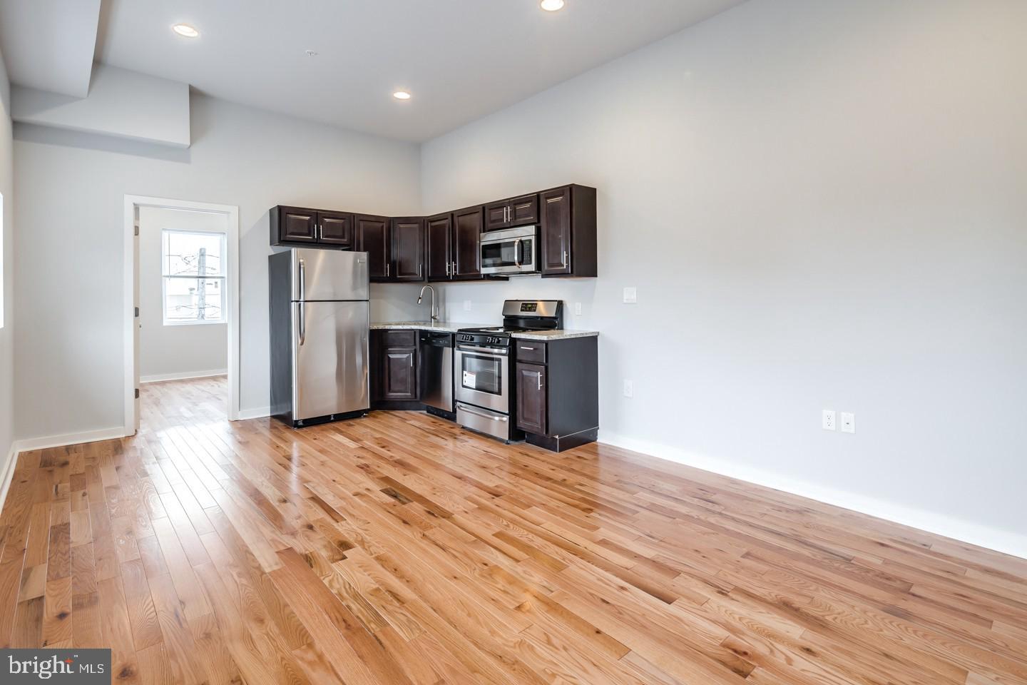Located in the Newbold/Melrose section of South Philadelphia on Broad/Wolf Street at 2221 S. Street, this stately limestone building was gut rehabbed with top of the line renovations. This large, 1BR/1BA apartment features: high ceilings, hardwood floors throughout, lots of natural sunlight, granite countertops, plenty of closet space and stainless steel appliances including a dishwasher. The large, tiled bathroom is sleek and modern. There is additional storage space in the basement where you will also find two sets of coin operated washer and dryers. Dedicated parking spot available with additional fee. Living on the edge of both Passyunk Square and Point Breeze, you'll have easy access to all of the surrounding shops, bars and restaurants; not to mention the Snyder subway stop (1 block away) which will have you to Center City in 5 minutes! Parking is available