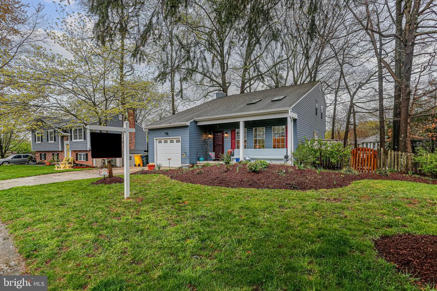 This spacious and thoughtfully designed 3-bedroom, 2.5-bath home offers a flexible layout with the potential for a fourth bedroom, all set across multiple inviting levels. From the moment you walk in, you’ll appreciate the open floor plan that creates a seamless connection between living, dining, and entertaining spaces. The main level is filled with natural light, highlighted by vaulted ceilings and skylights that enhance the airy feel. The kitchen is perfectly positioned at the heart of the home, featuring sleek quartz countertops, stainless steel appliances, and easy access to the expansive multi-level deck—perfect for outdoor dining or relaxing in your private fenced yard. Just off the kitchen, a second living area offers a cozy retreat with a pellet stove, ideal for quiet evenings in. Conveniences on the main level include a powder room, laundry room, and interior access to the one-car garage—adding practicality to everyday living. Upstairs, the oversized primary bedroom is a true retreat. The luxurious en-suite bathroom is a standout feature, boasting a frameless glass shower, modern tile finishes, and spa-like comfort. Two additional bedrooms and a full hall bath provide plenty of space for family, guests, or a home office. One bedroom is generously sized with the option to easily convert it into two separate rooms for even more flexibility. The lower level includes an unfinished basement with abundant storage space and endless potential for customization.

Tucked within a charming water-oriented community with shared pier access and kayak storage, this home offers the perfect blend of comfort, functionality, and location. Ideally situated between Annapolis, Washington D.C., and Baltimore, you'll enjoy easy access to major commuter routes while still coming home to a peaceful, private setting.