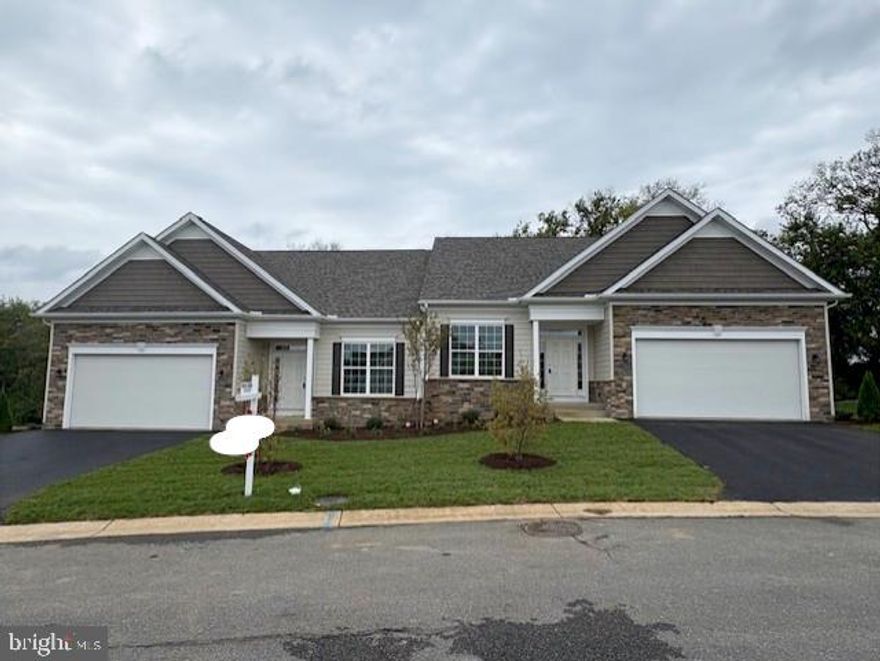 Beautiful New construction completed and will be ready for occupancy October 1st. This wonderful light and bright villa features three bedrooms and three full baths.  Master bedroom and bath with walk in closet located on the main level with an additional bedroom and bath. Open concept living room and kitchen area with granite counters making it easy to entertain and not miss a thing with your guests. Come tour this Manor House Builders villa to you see for yourself all that it has to offer. You won't be disappointed! Located close to shopping, medical and commuter routes.
Photos are from a similar previously built home.