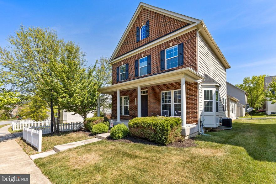 NEW PRICE!!

Welcome to The Preserve at Piscataway, 2,880 square feet across three finished levels with the kind of details that actually make a difference day to day. The main level features an open foyer, engineered hardwood floors, a dedicated home office with built-in bookshelves and bay window, a formal dining room with tray ceiling and bay window, a family room with fireplace, eat-in kitchen with stainless steel appliances, breakfast nook, and a powder room. Upstairs you'll find three bedrooms and two full baths with a laundry room on the same level. The primary suite is 15'11" x 13'3" with a tray ceiling and customized walk-in closet. The primary bath has a double sink vanity and stand-in shower. Bedrooms two and three are carpeted with a full bath nearby. Hardwood continues through the hallway and stairs. The finished basement features a 26' x 26' family room, plenty of space for whatever you need, a wet bar with mini fridge, a 7-speaker sound system, storage room, and a half bath with plumbing already roughed in for a full bath conversion. Situated on a corner lot, this home is one of the few on the block with a full-width covered front porch. The detached two-car garage connects directly to the house, making coming and going easy regardless of the weather. Crown molding throughout and ceiling fans in every bedroom.

VIRTUAL TOUR AVAILABLE