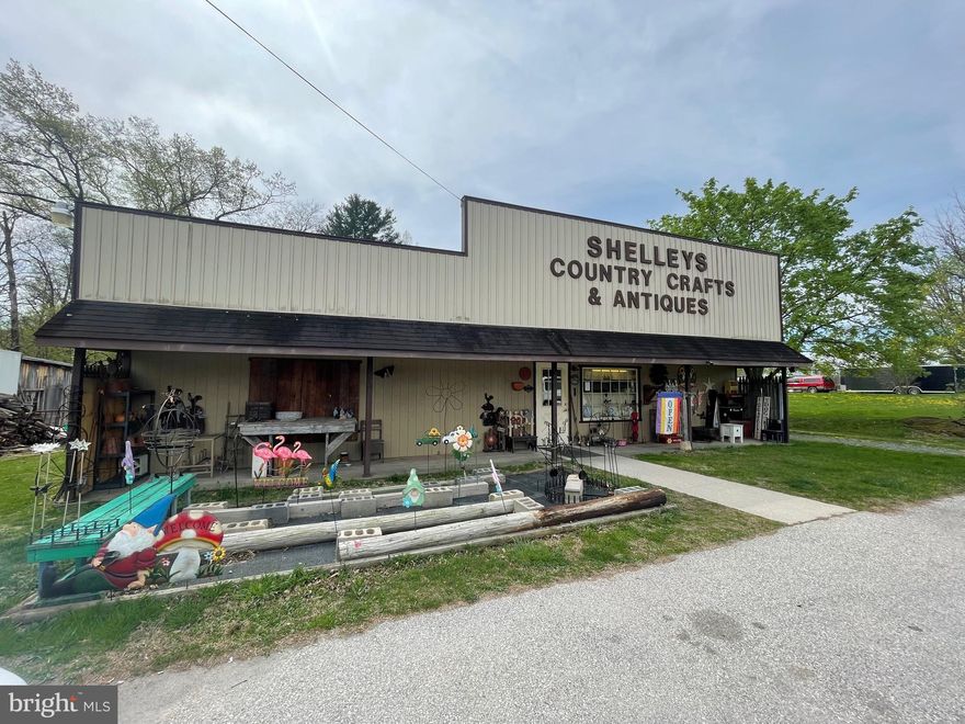 Commercial/Residential Use offers the opportunity to have your business location and additional rental income from 4 other sources.   Double-wide is currently leased for residential use; the end unit is currently leased for a photography studio, and 2 additional spaces are ready to be leased.   With so many possibilities, you won't want to miss out on this great investment property.   1.65 acres of prime real estate along Route 30 with high visibility and abundant traffic.